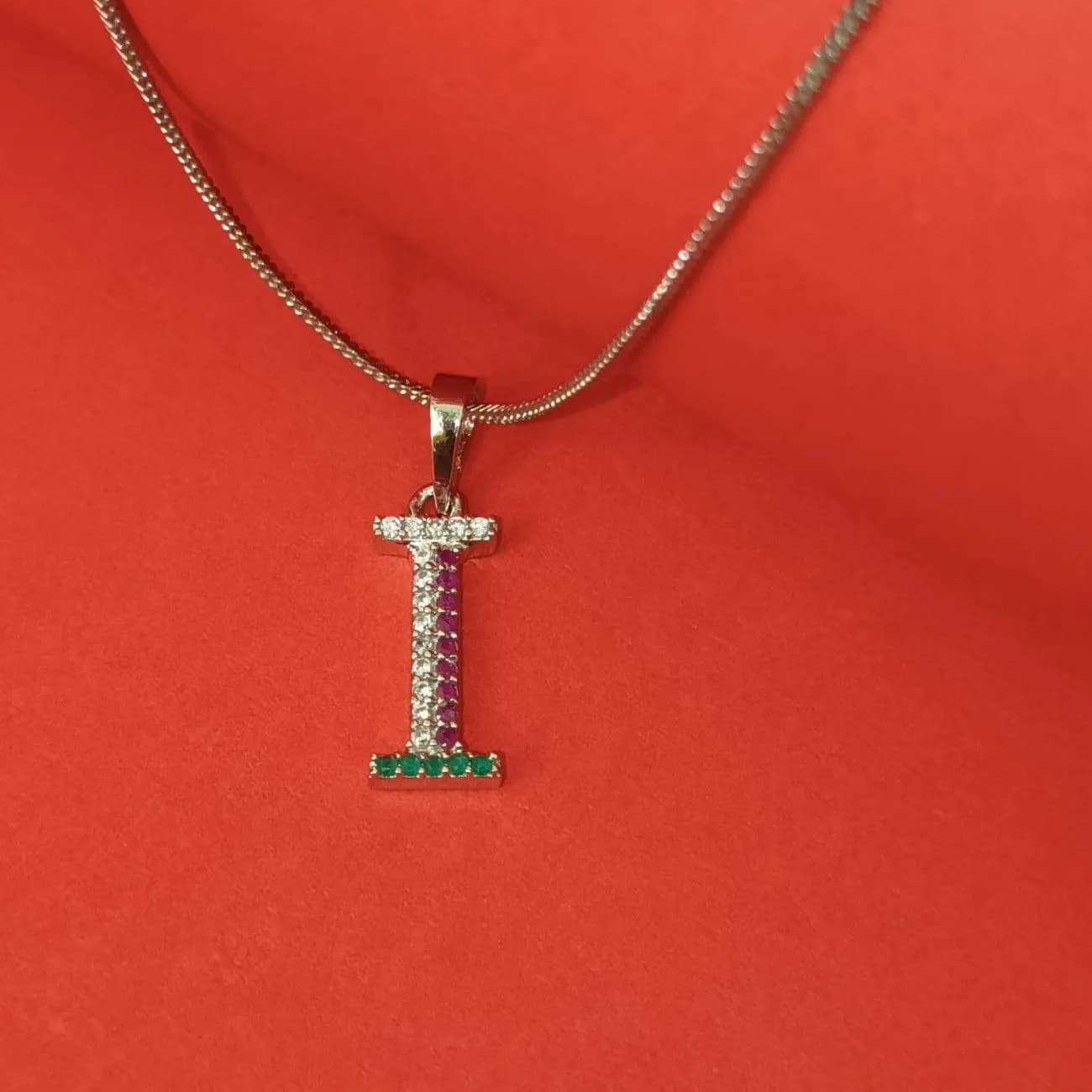 Nimoraa I Initial Silver Plated Pendant Chain with Red & Green Stones