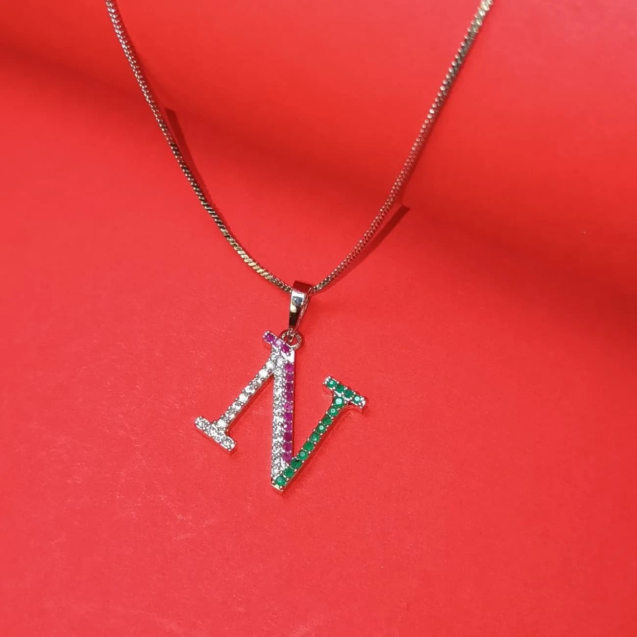 Nimoraa N Initial Silver Plated Pendant Chain with Red & Green Stones