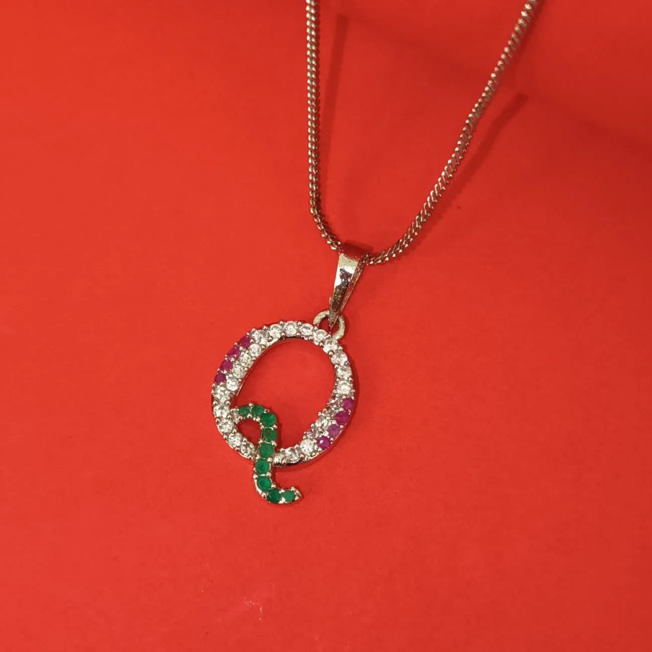 Nimoraa Q Initial Silver Plated Pendant Chain with Red & Green Stones