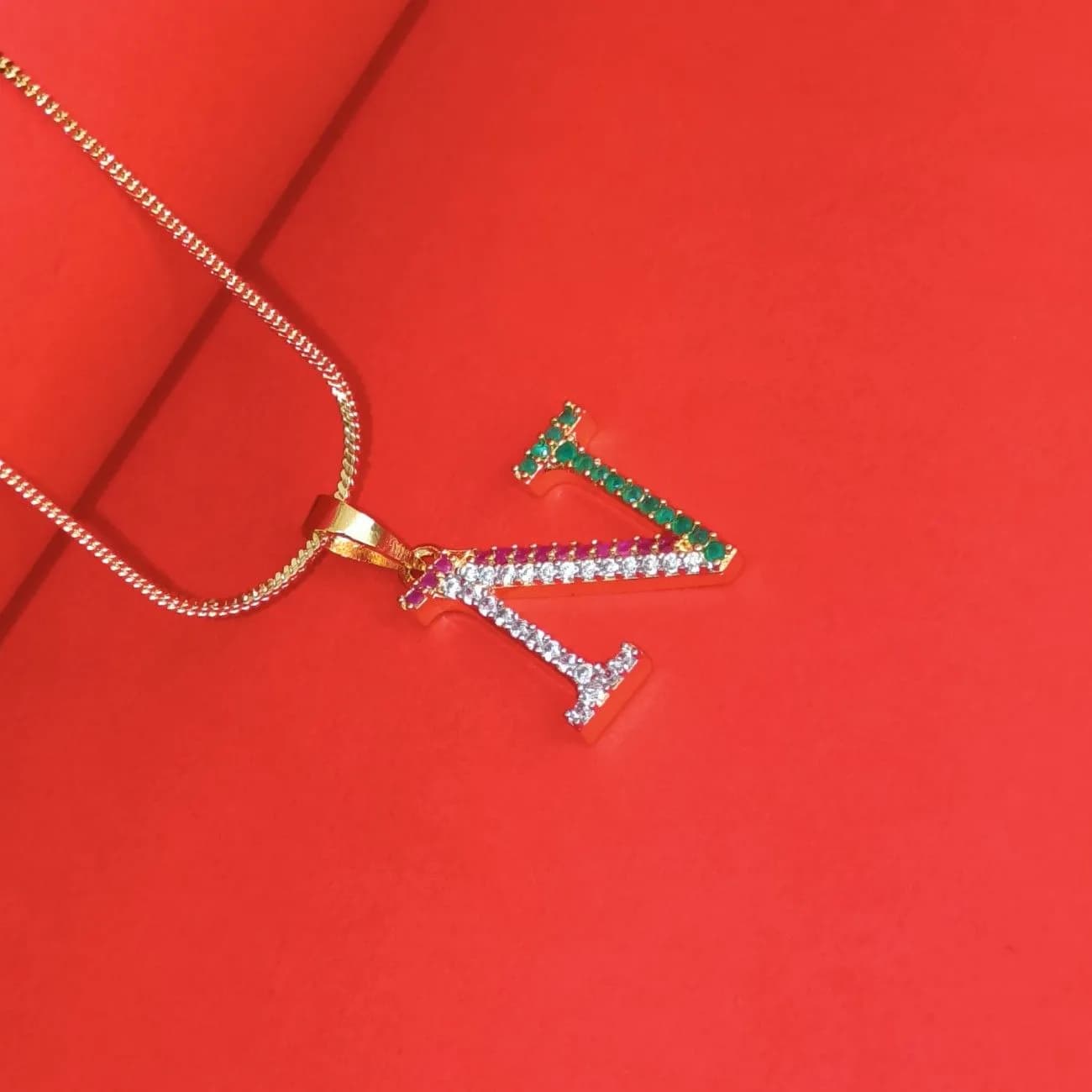 Nimoraa N Initial Gold Plated Pendant Chain with Red & Green Stones