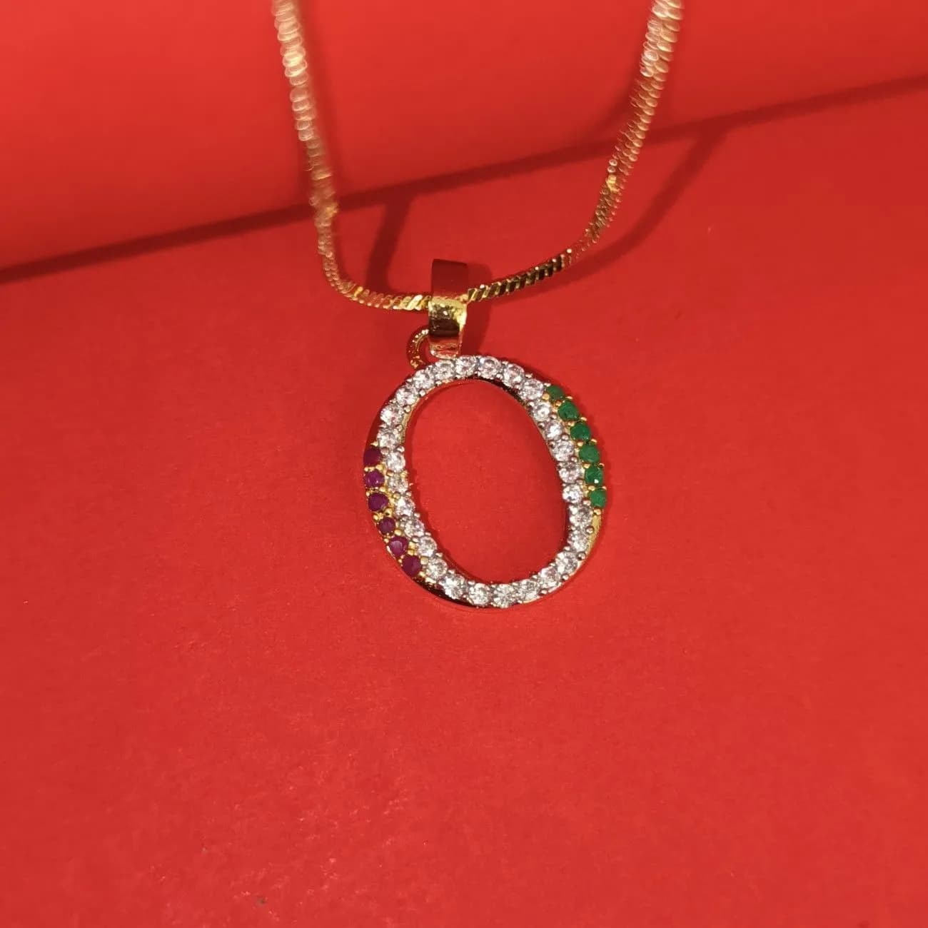 Nimoraa O Initial Gold Plated Pendant Chain with Red & Green Stones