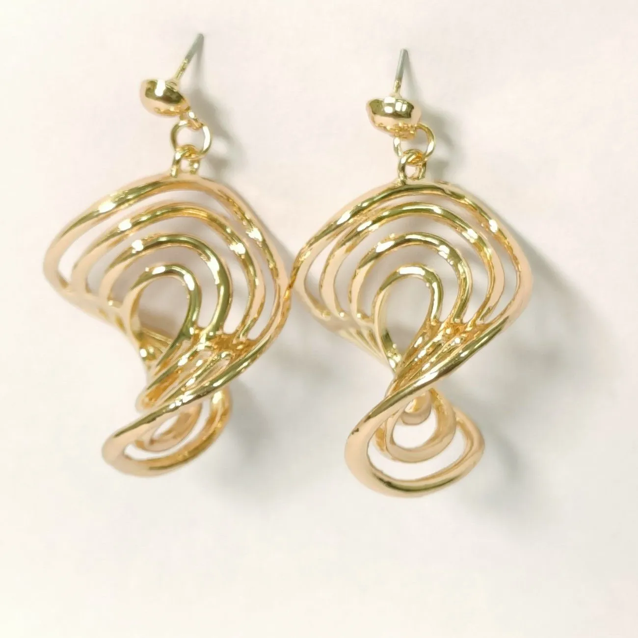 Nimoraa Golden Mirage Twist Earrings