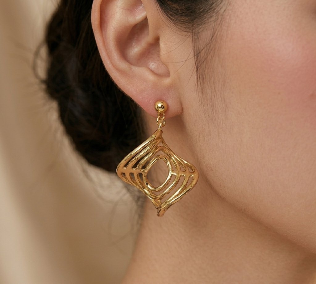 Nimoraa Golden Mirage Twist Earrings