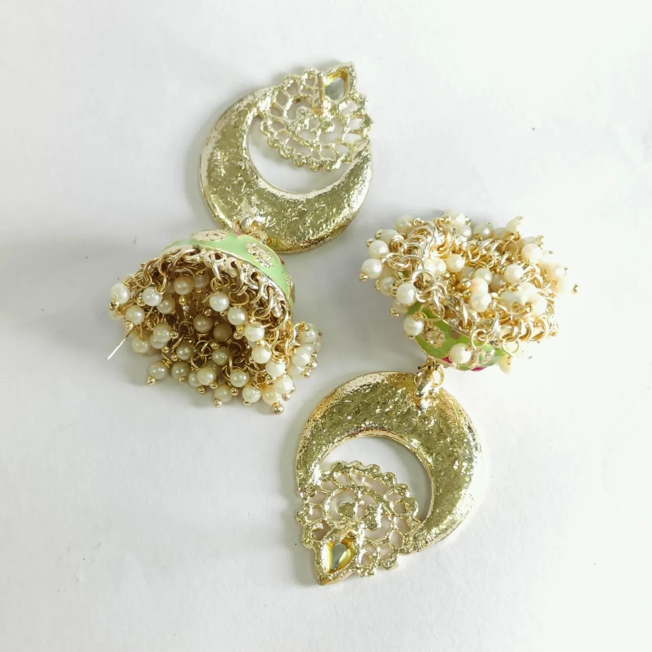 Nimoraa Pista Noor Jhumka Earrings