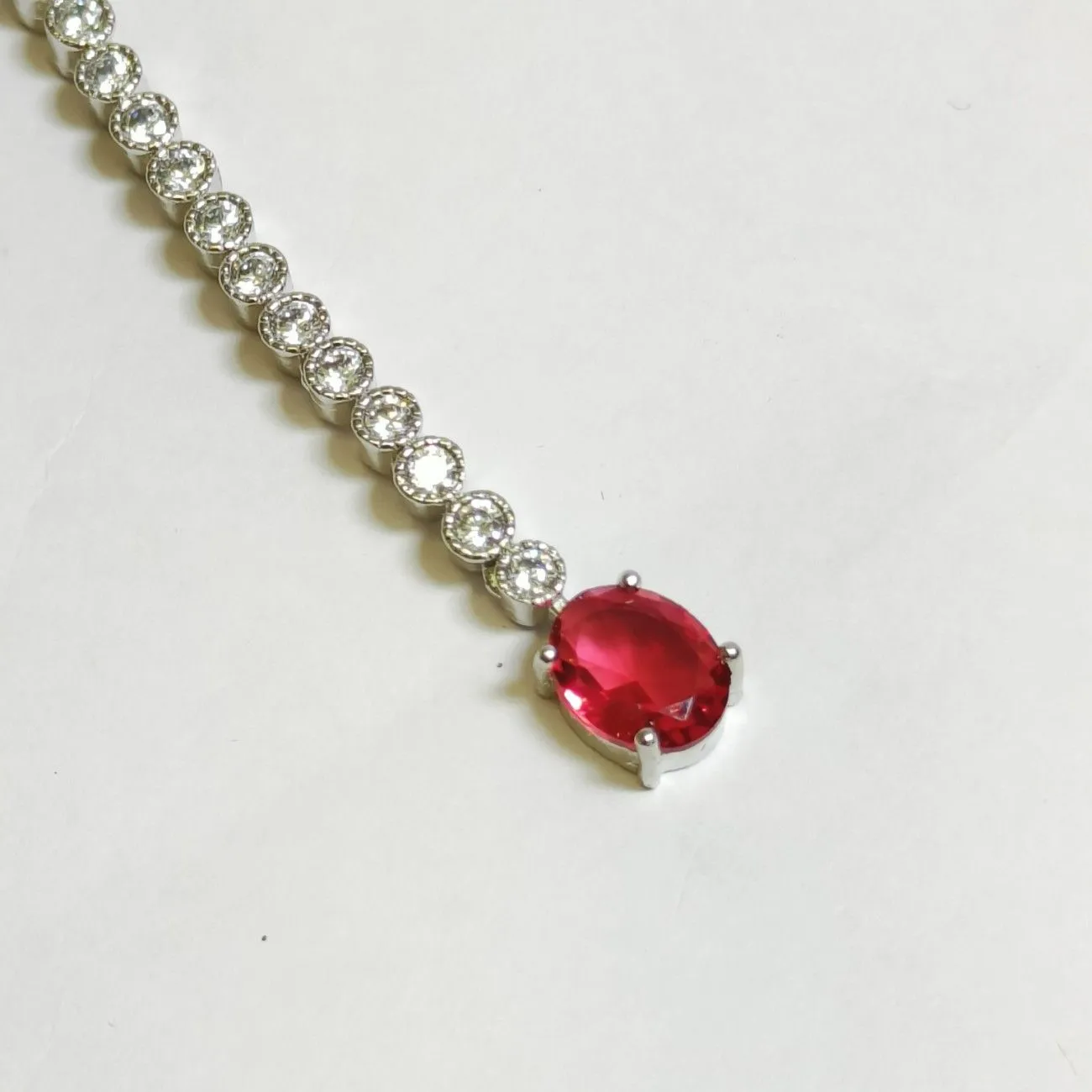 Nimoraa Royal Ruby Solitaire Maangtikka