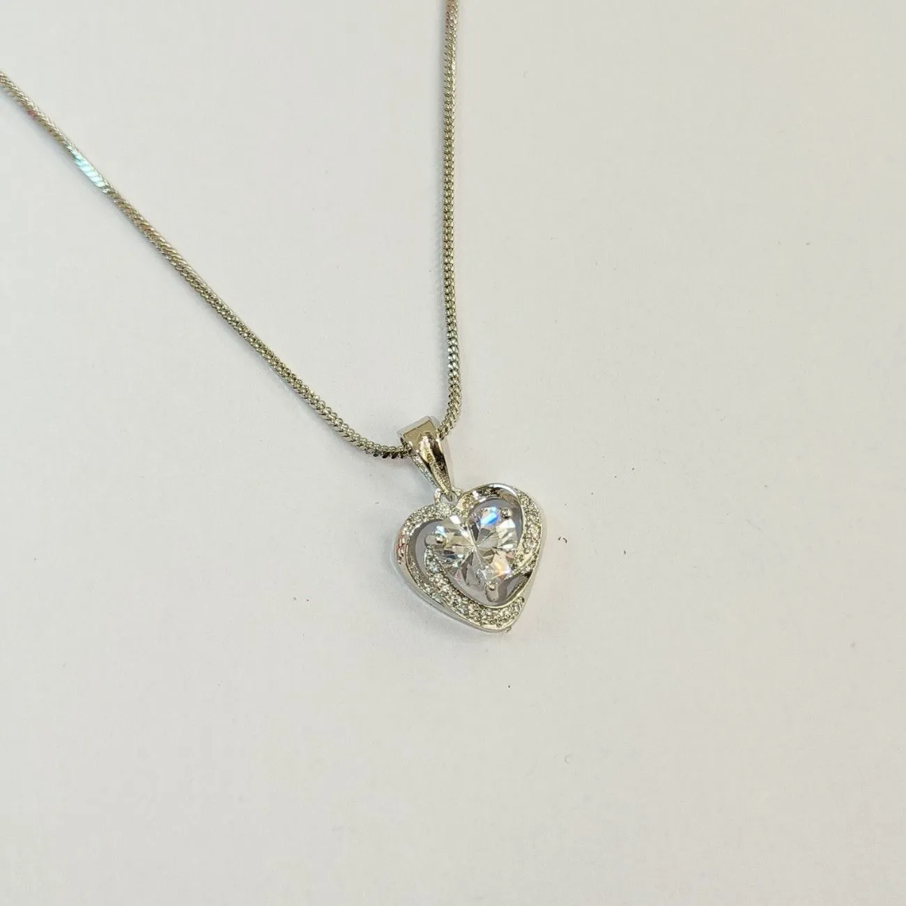 Nimoraa White Heart Embrace Silver Pendant Set