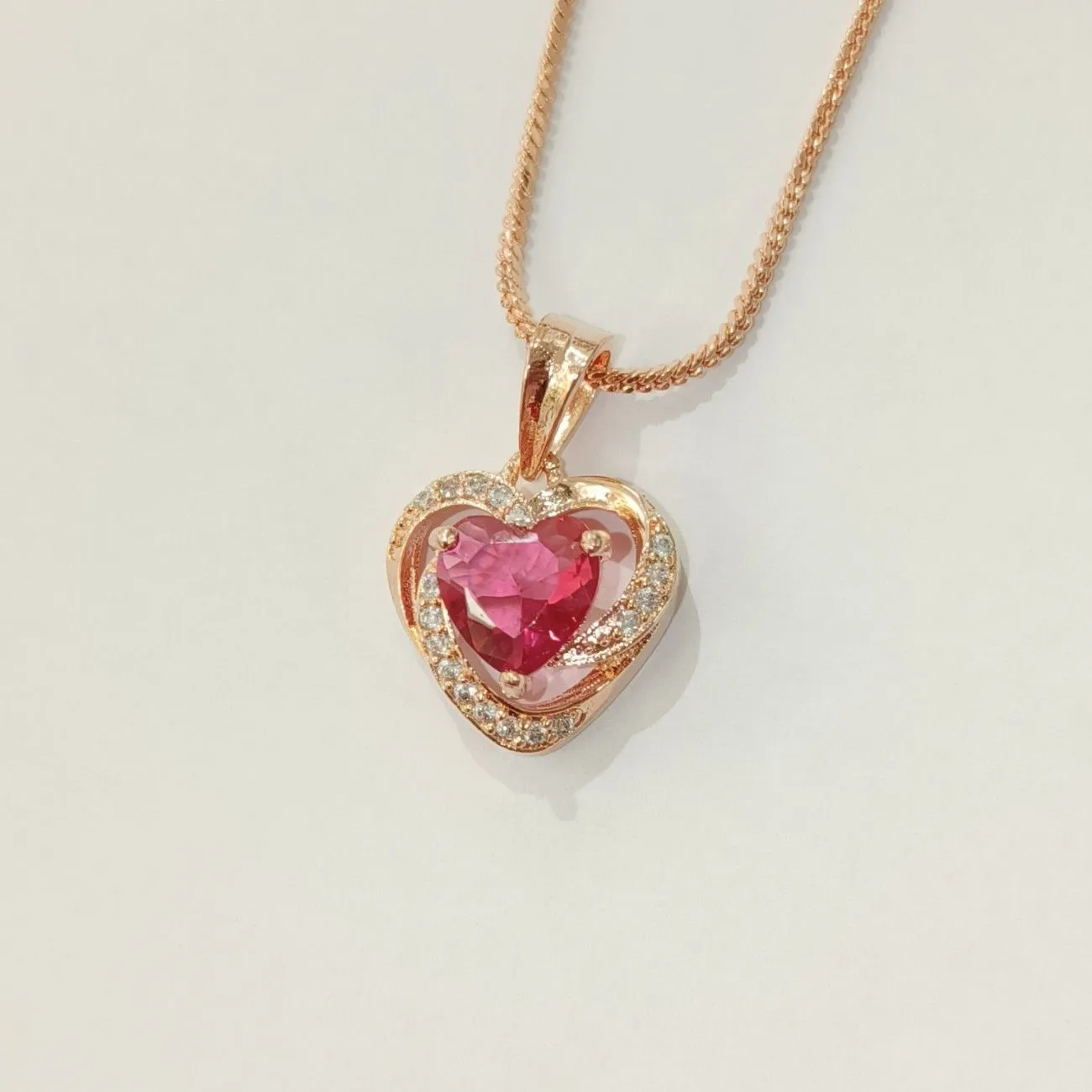 Nimoraa Red Heart Embrace Rosegold Pendant Set