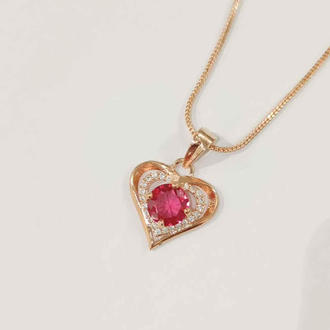 Heart pendant with red solitaire rosegold chain set