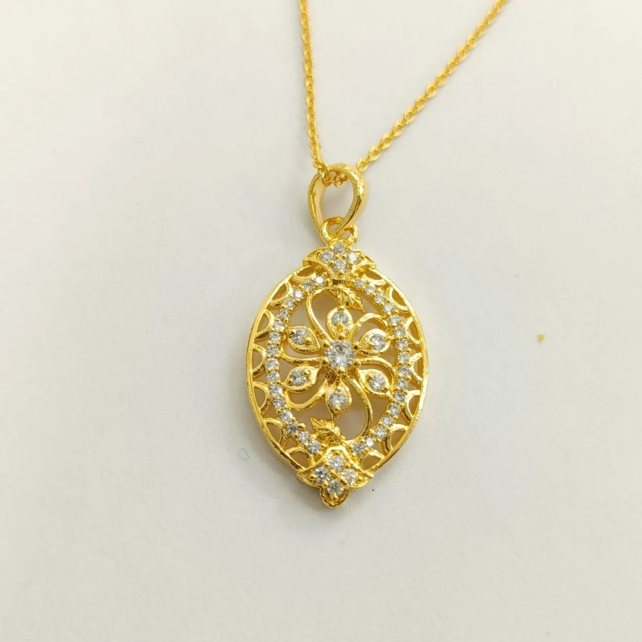 Nimoraa Gold Plated Floral Filigree Pendant Set with Chain