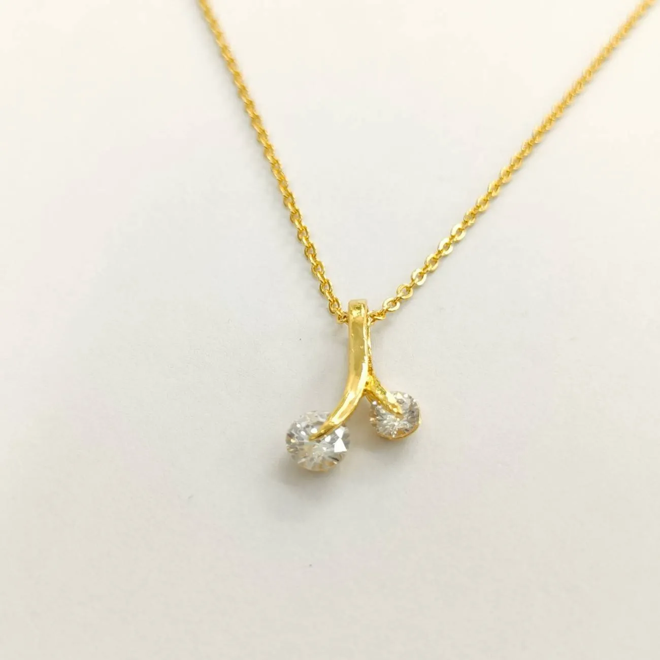 Nimoraa Twin Gold-Cherry Solitaire Pendant Set