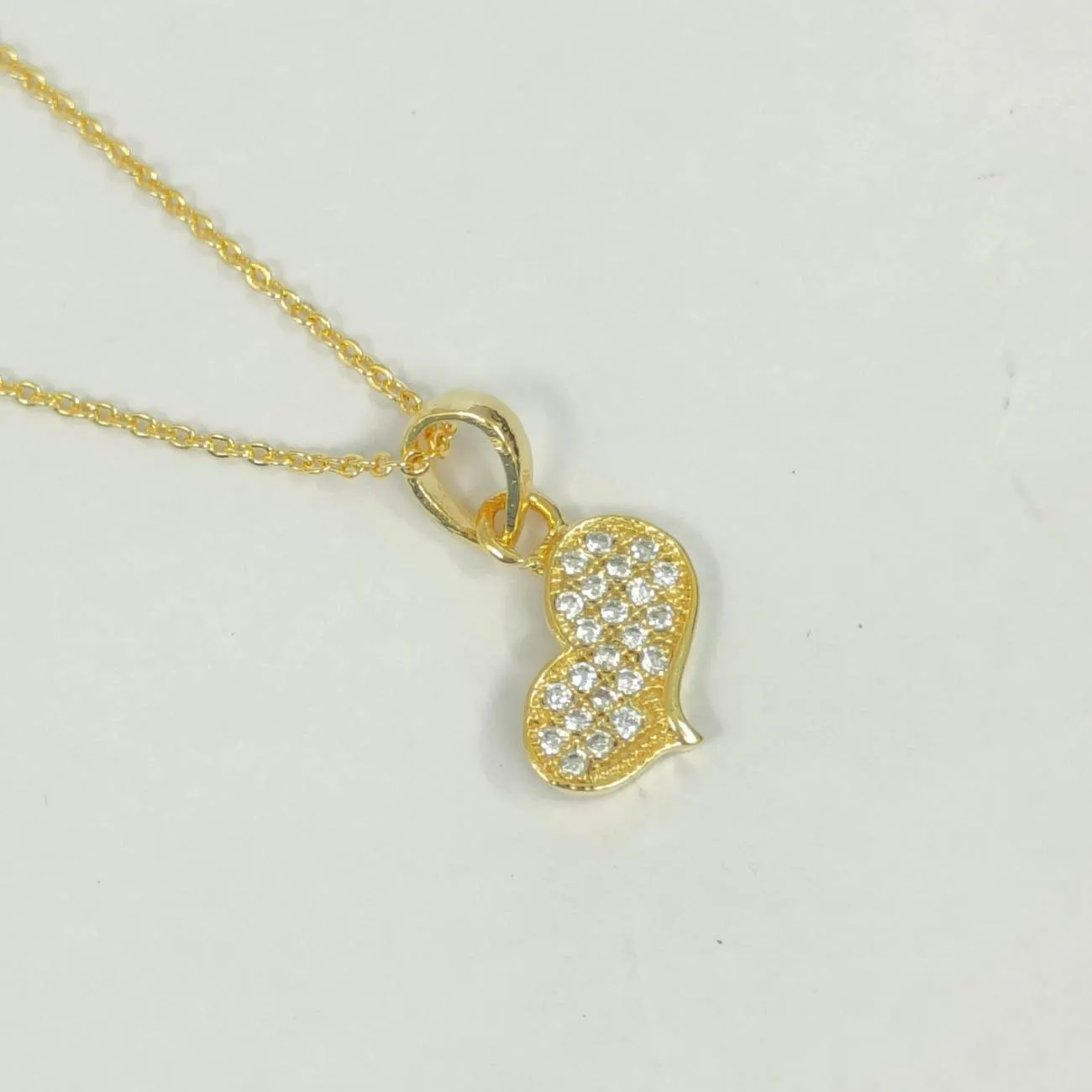 Nimoraa Twin Heart Spark Gold Pendant