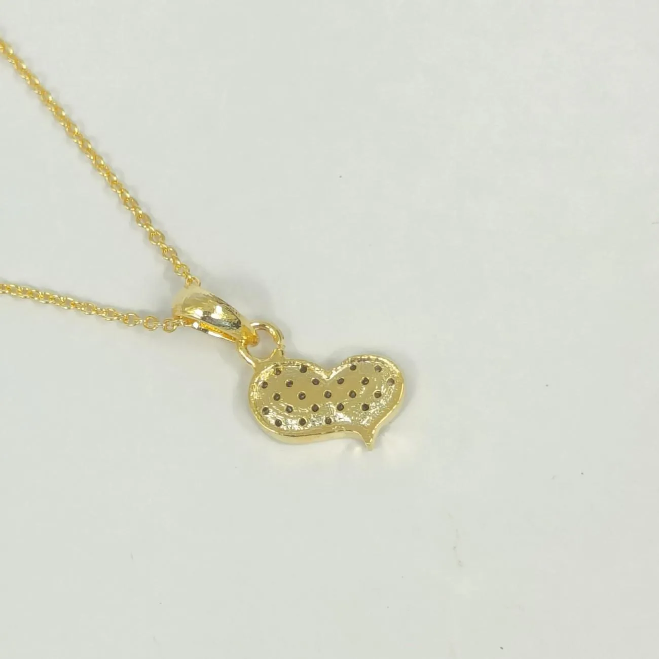 Nimoraa Twin Heart Spark Gold Pendant