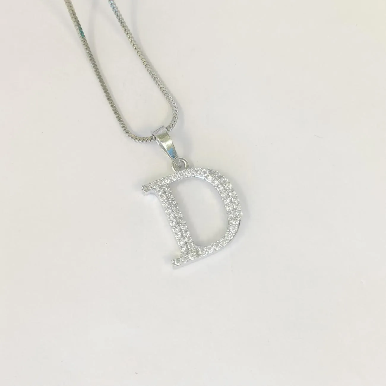 Nimoraa Silver small Initial "D" Pendant