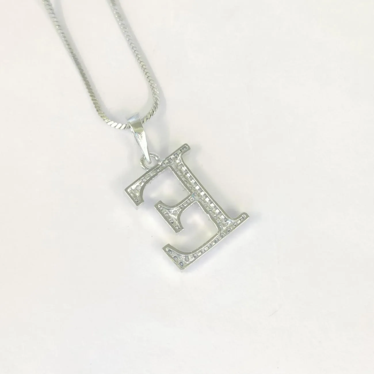 Nimoraa Silver Small Initial "E" Pendant