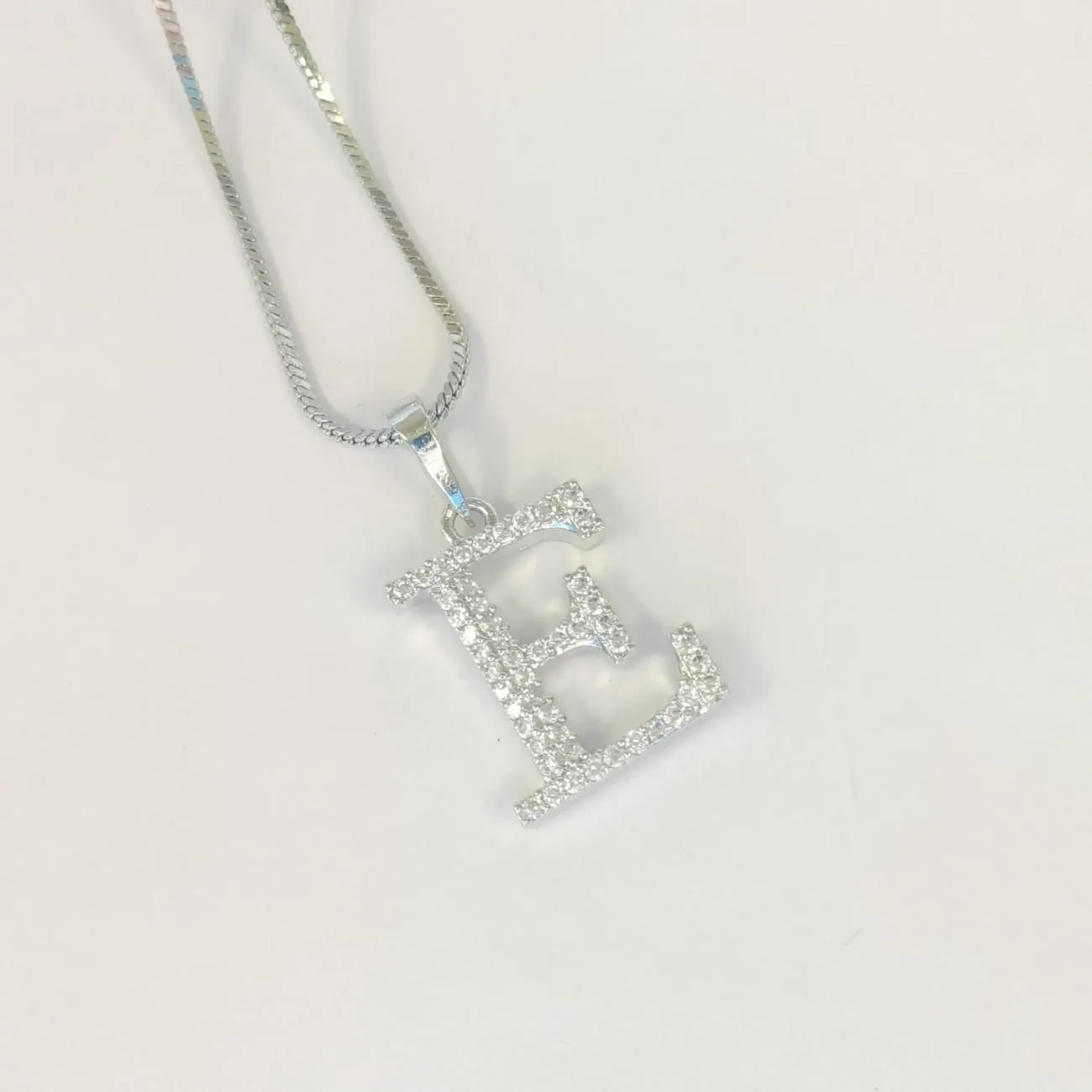 Nimoraa Silver Small Initial "E" Pendant
