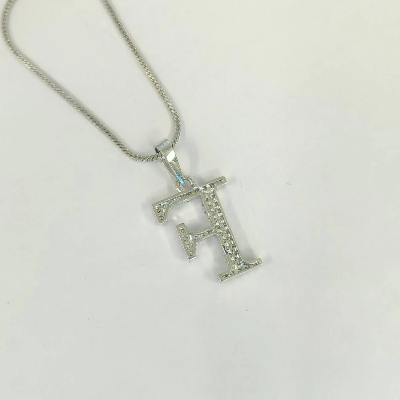Nimoraa Silver Small Initial "F" Pendant