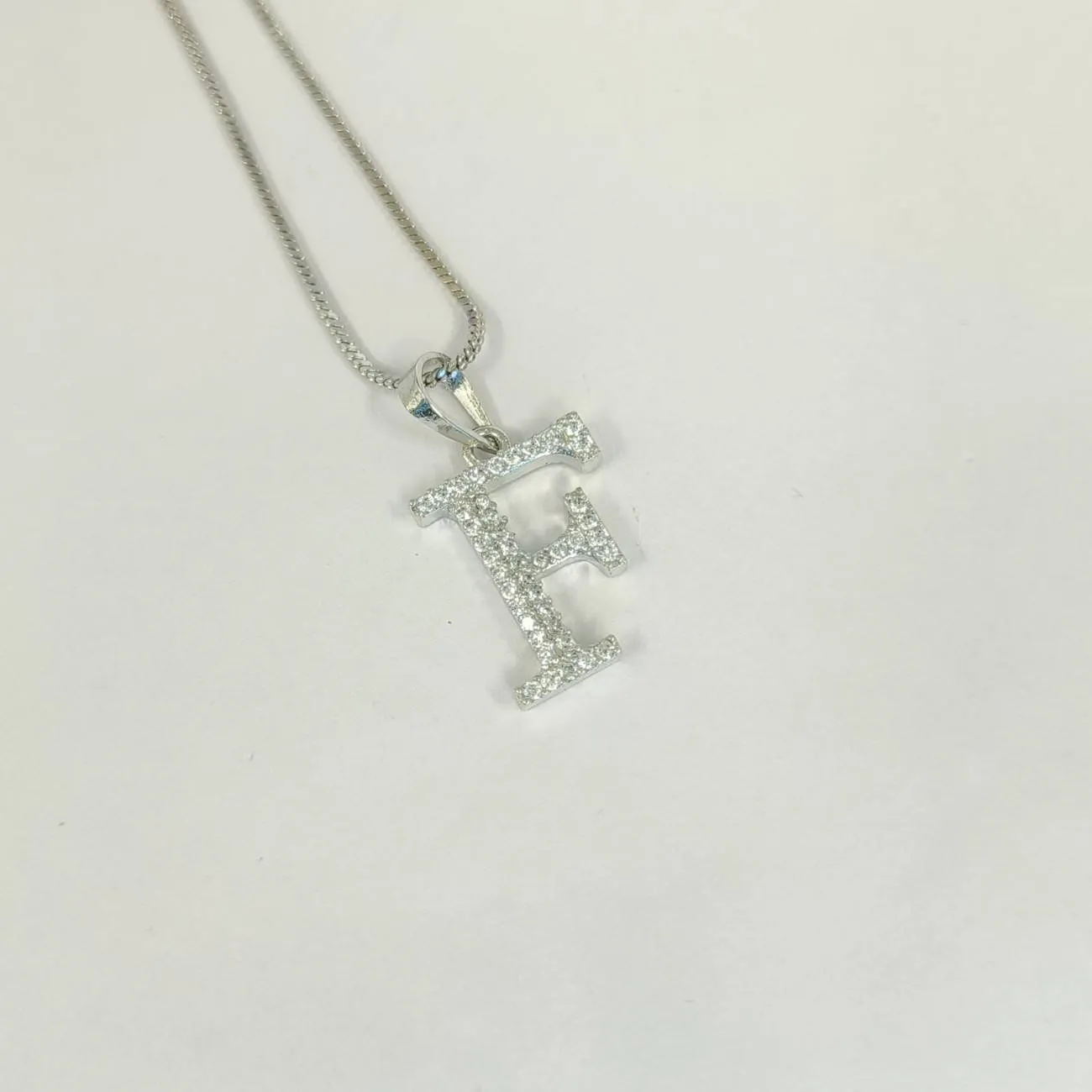 Nimoraa Silver Small Initial "F" Pendant