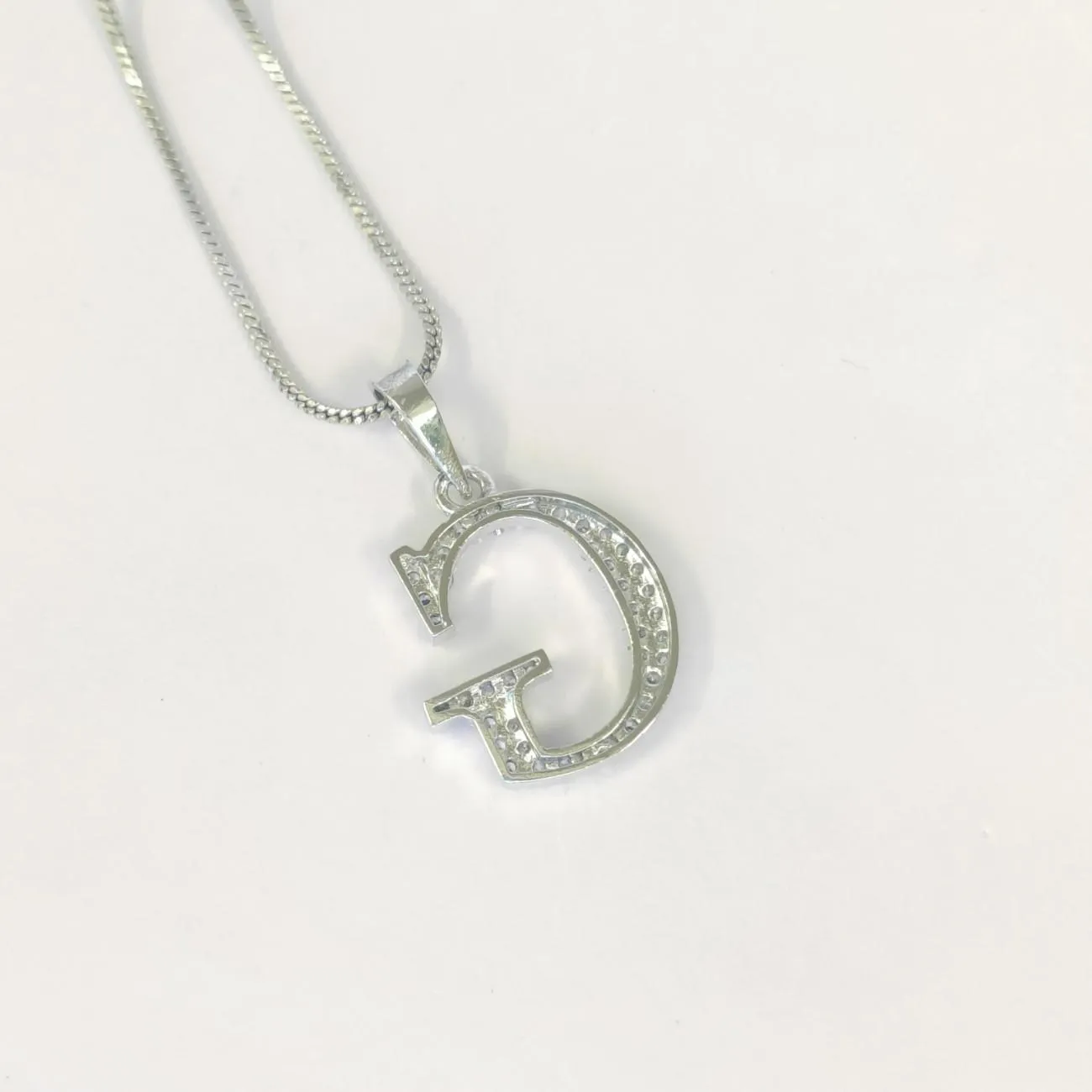 Nimoraa Silver Small Initial "G" Pendant
