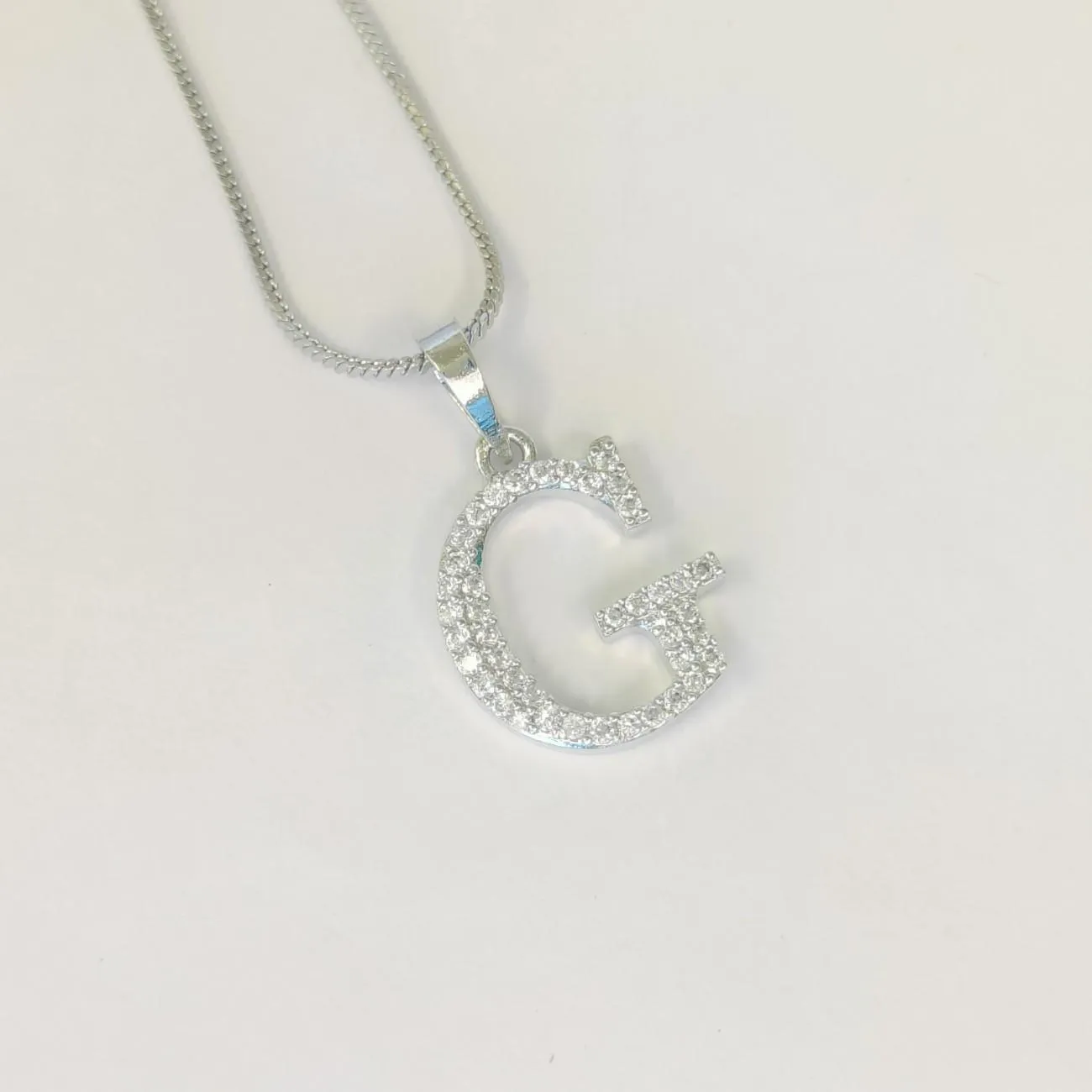 Nimoraa Silver Small Initial "G" Pendant