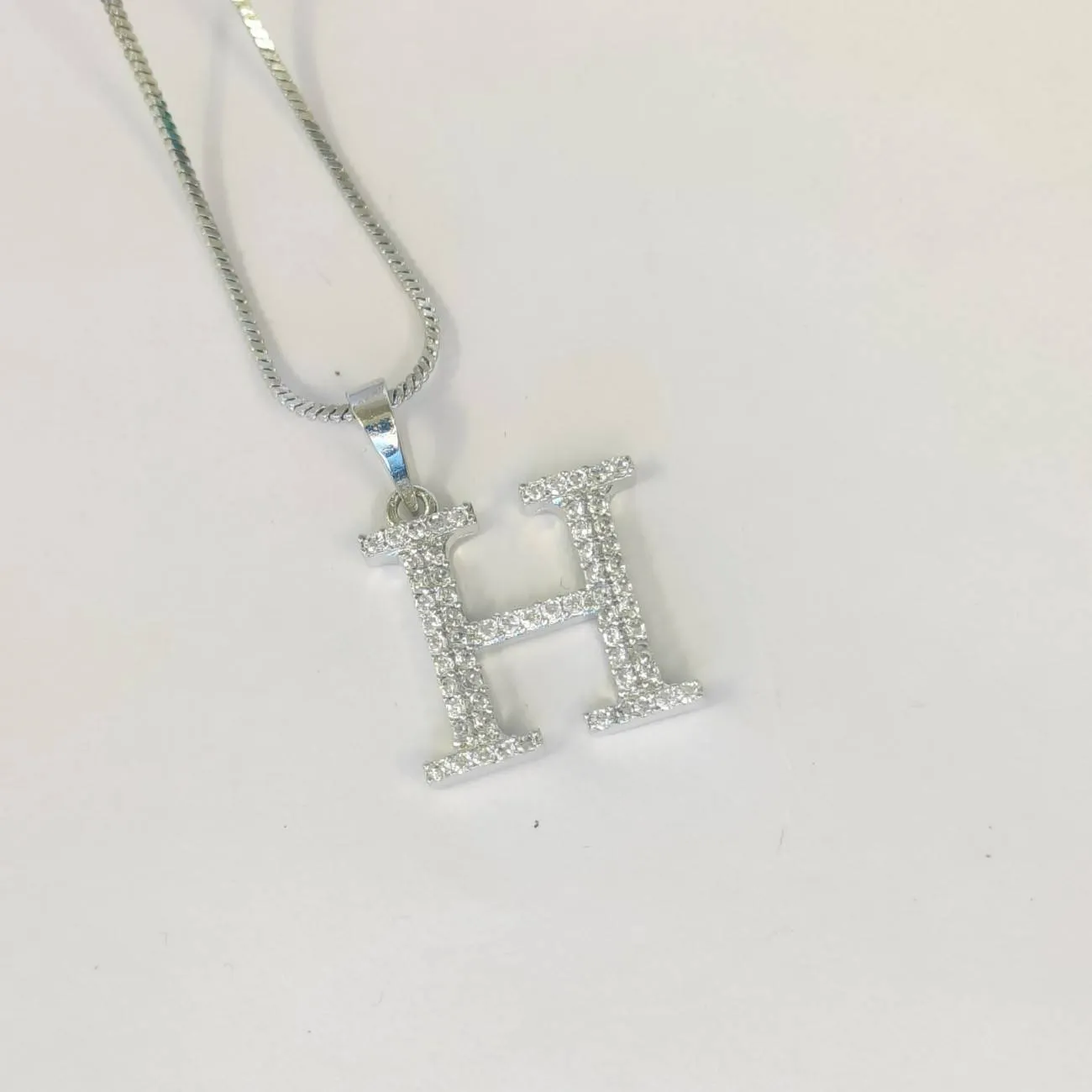 Nimoraa Silver Small Initial "H" Pendant