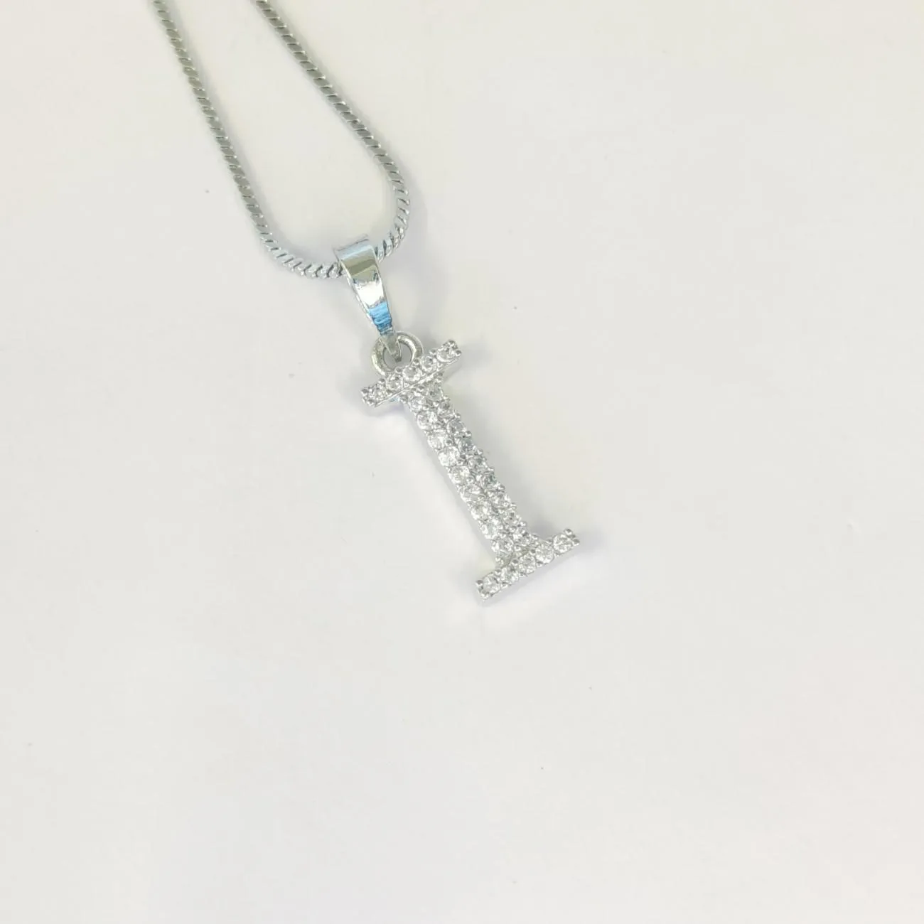 Nimoraa Silver Small Initial "I" Pendant