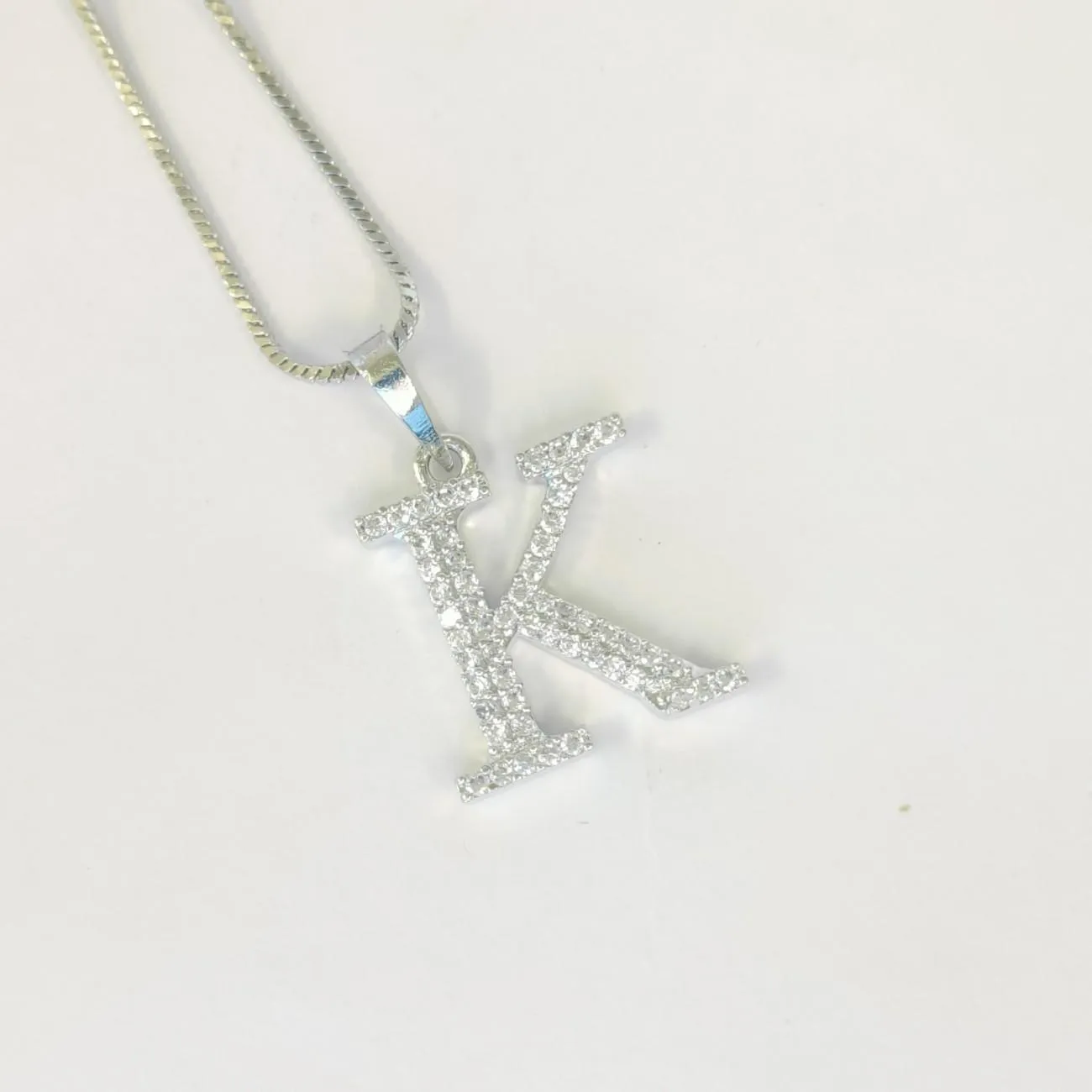 Nimoraa Silver Small Initial "K" Pendant