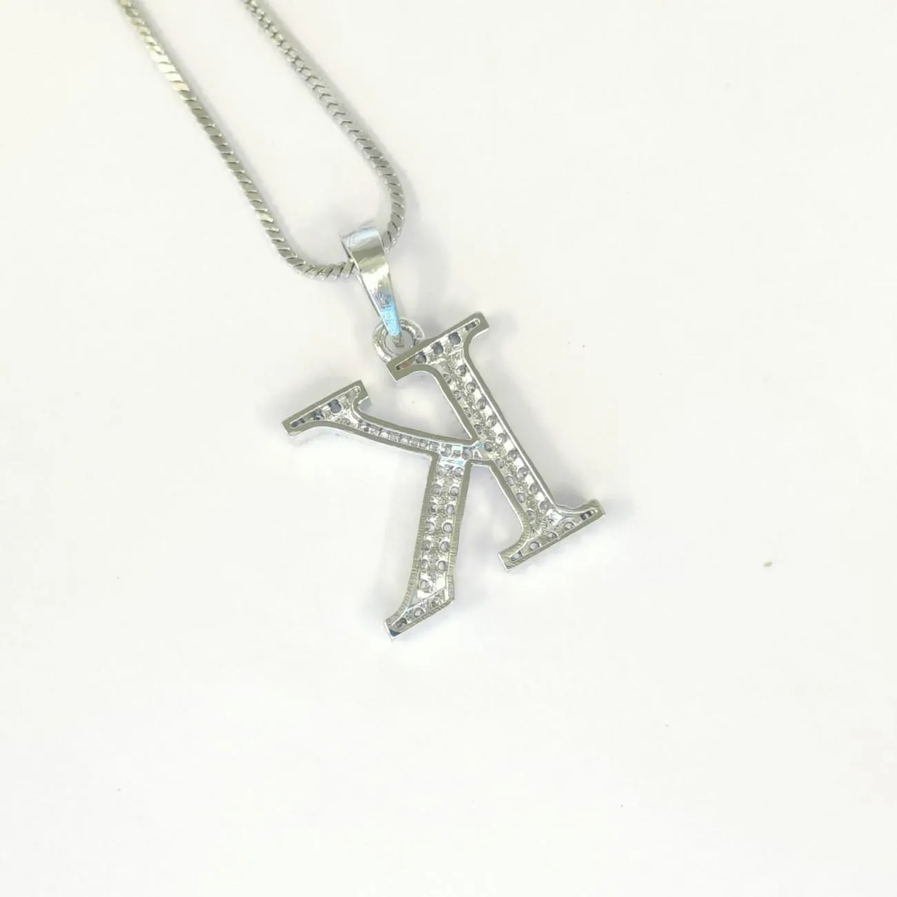 Nimoraa Silver Small Initial "K" Pendant