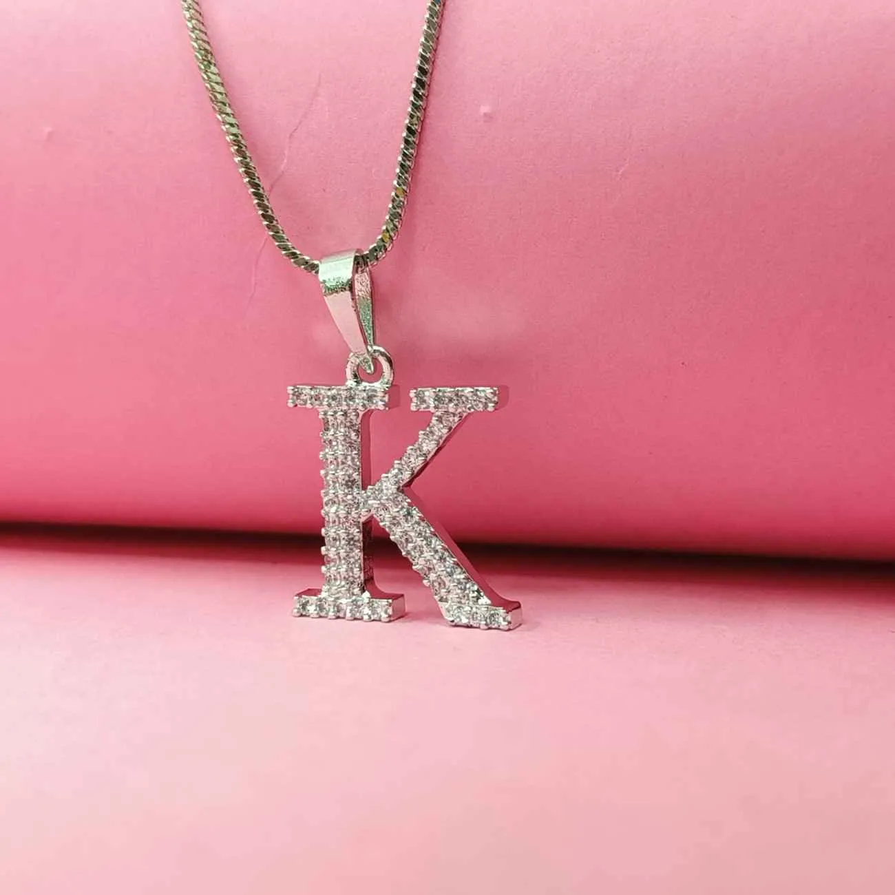 Nimoraa Silver Small Initial "K" Pendant