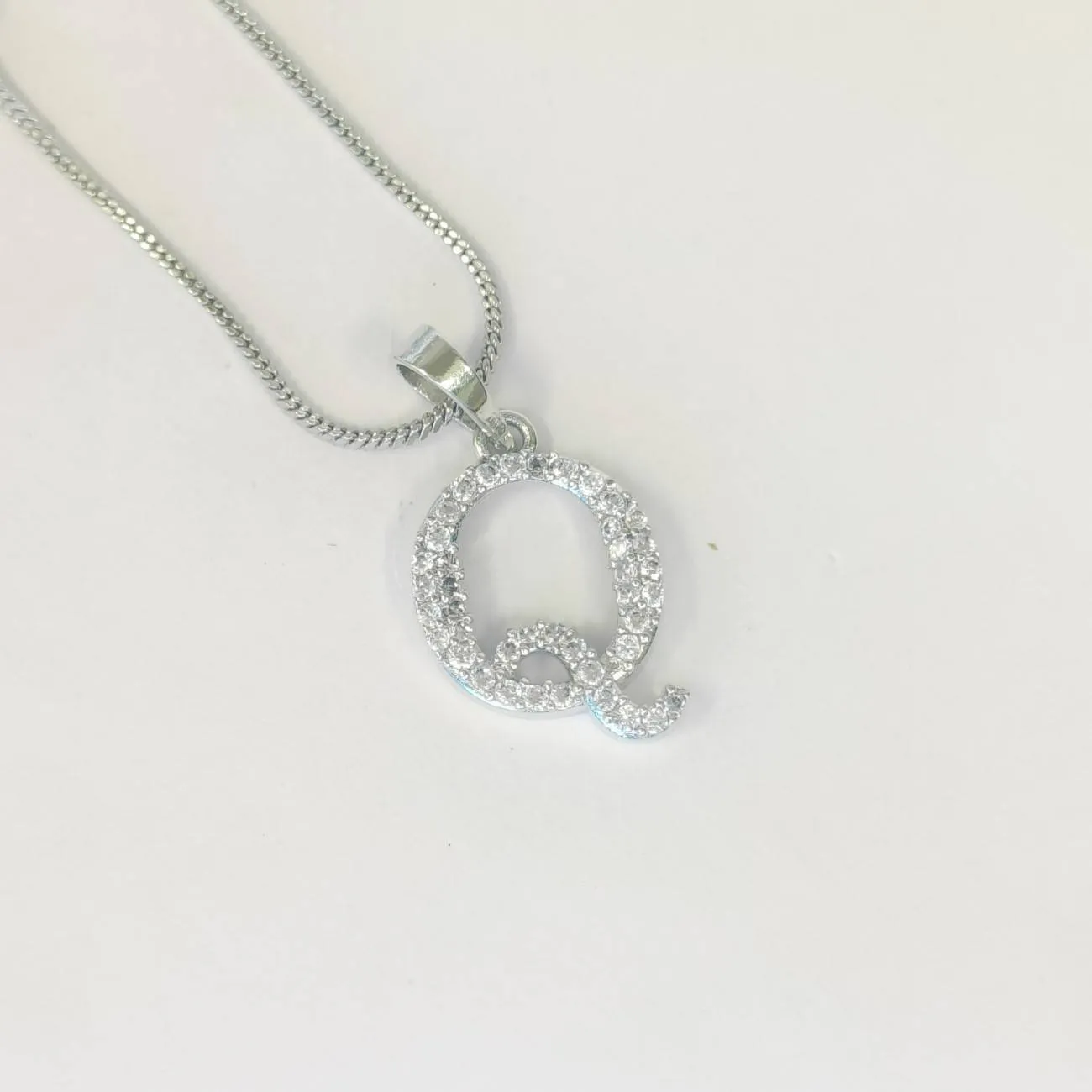Nimoraa Silver Small Initial "Q" Pendant