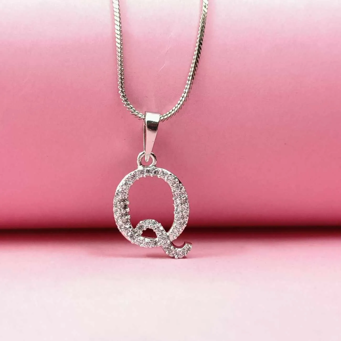 Nimoraa Silver Small Initial "Q" Pendant