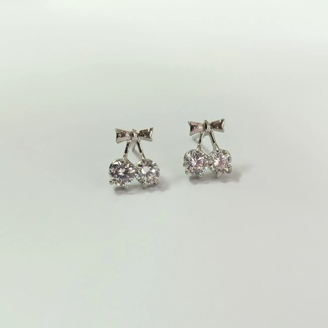 Nimoraa Twin Silver-Cherry Solitaire Pendant Set