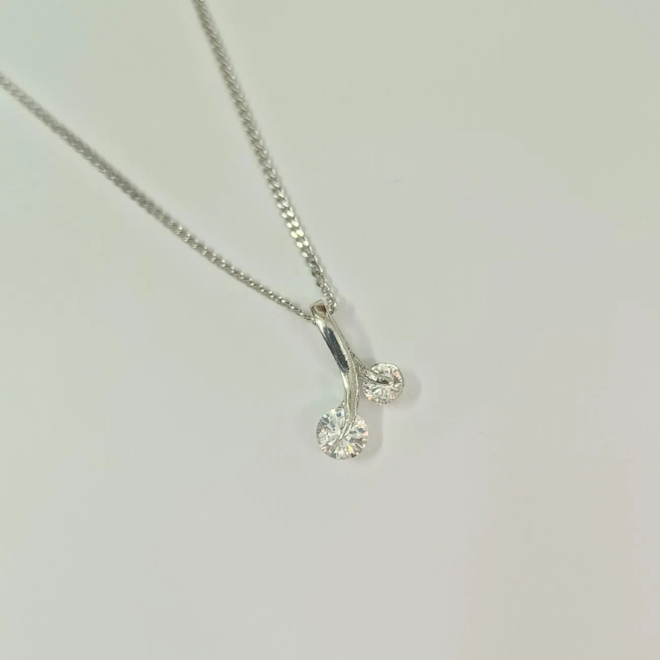 Nimoraa Twin Silver-Cherry Solitaire Pendant Set