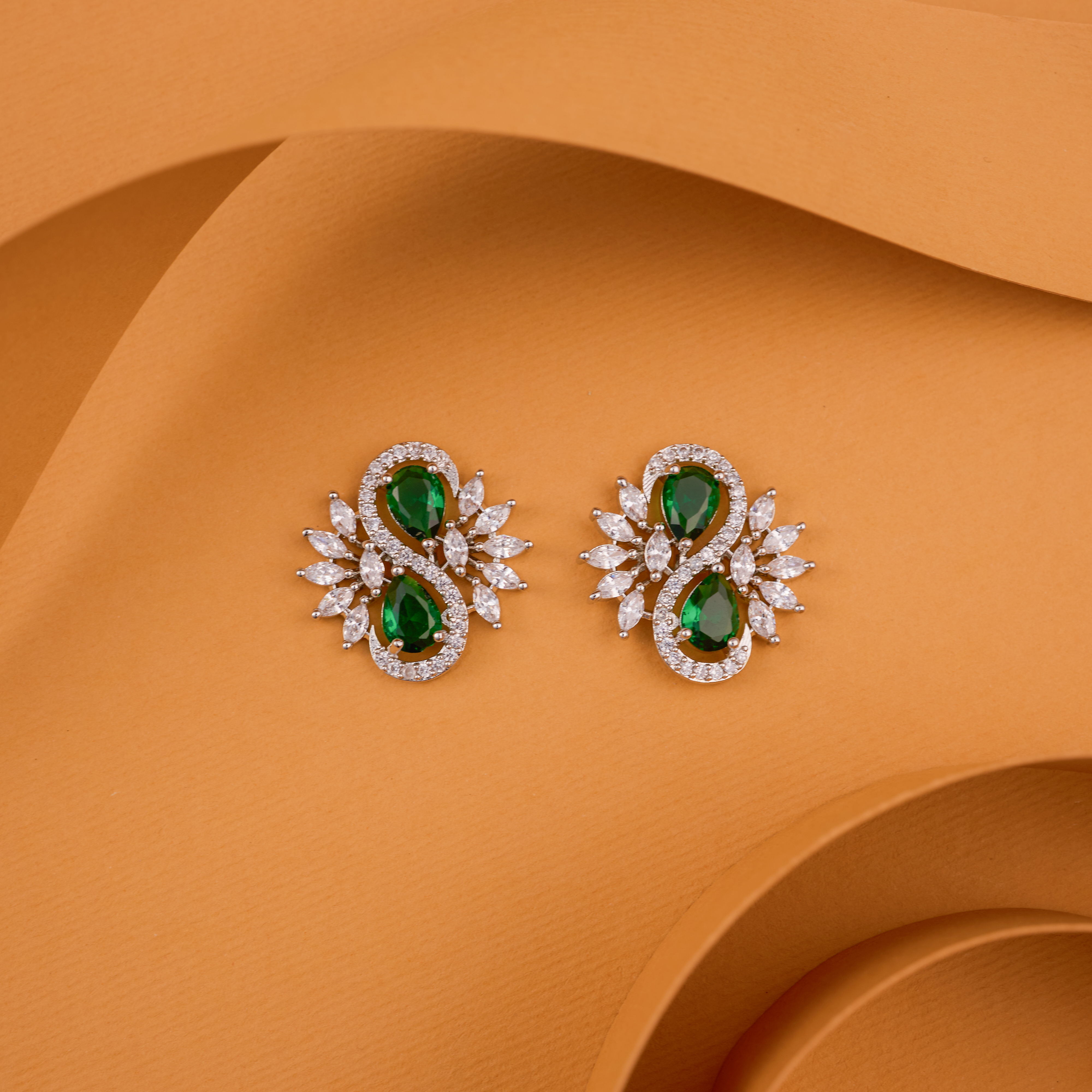 The Infinity Emerald Glow Floral Studs