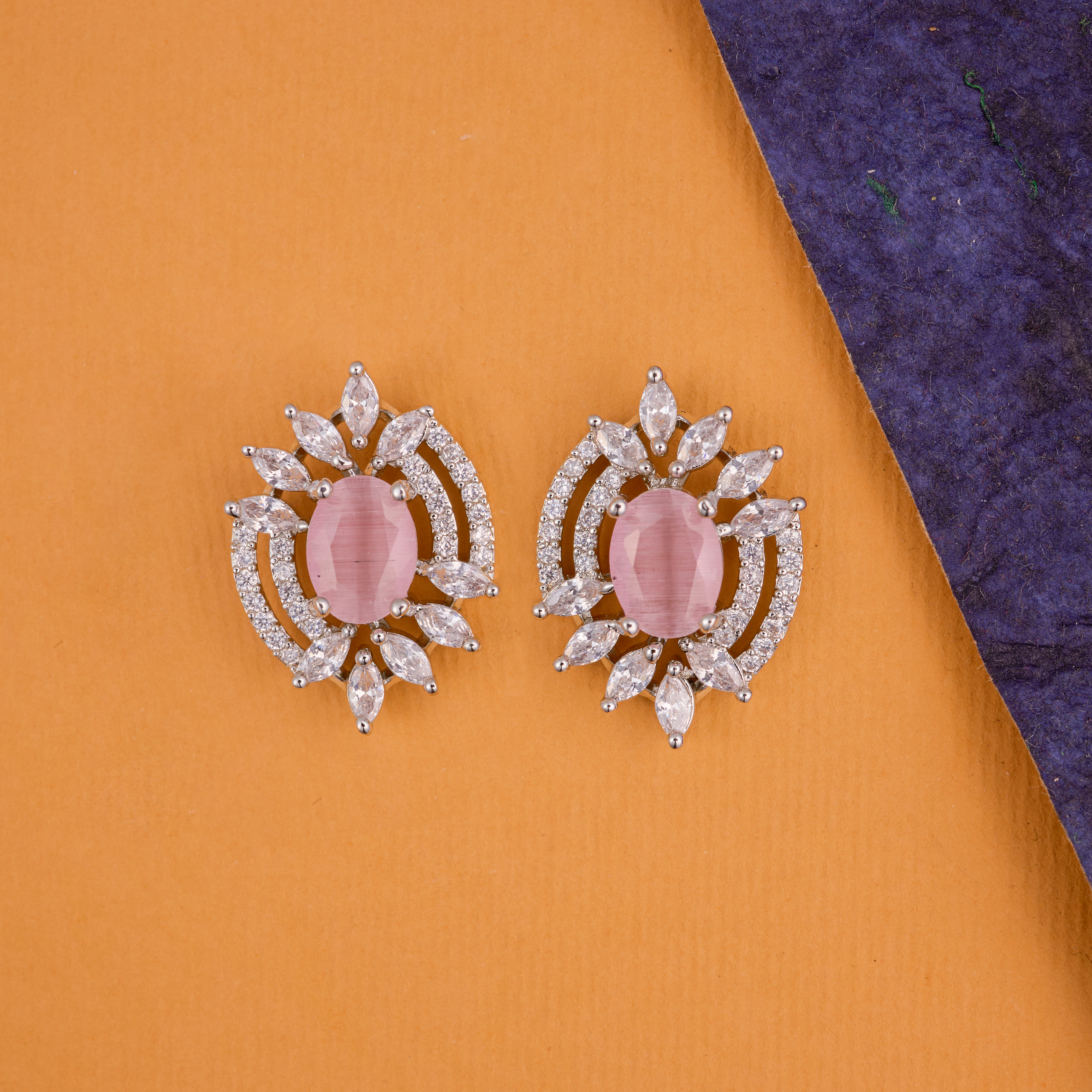 Pink sparkle burst studs