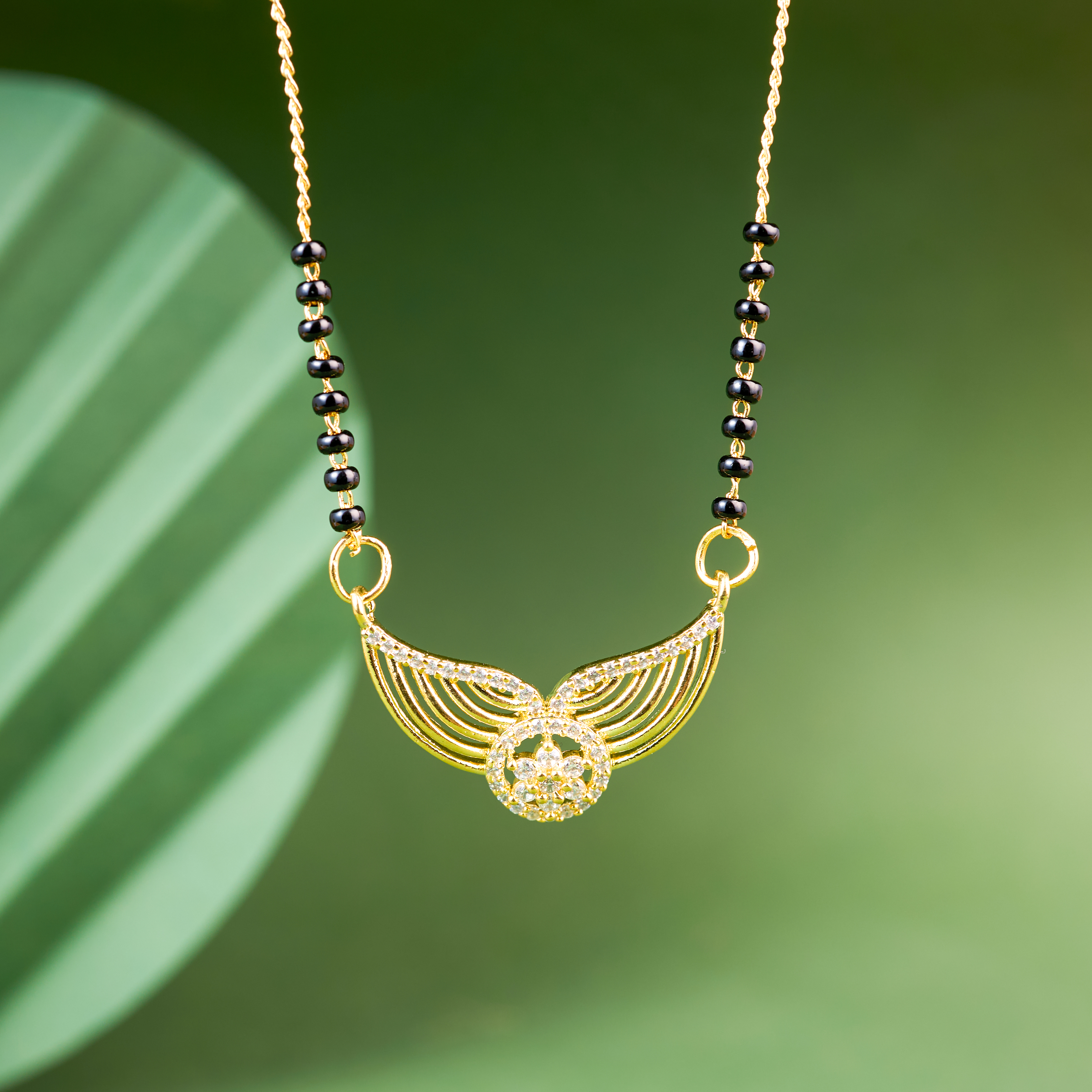 gold wings of love mangalsutra