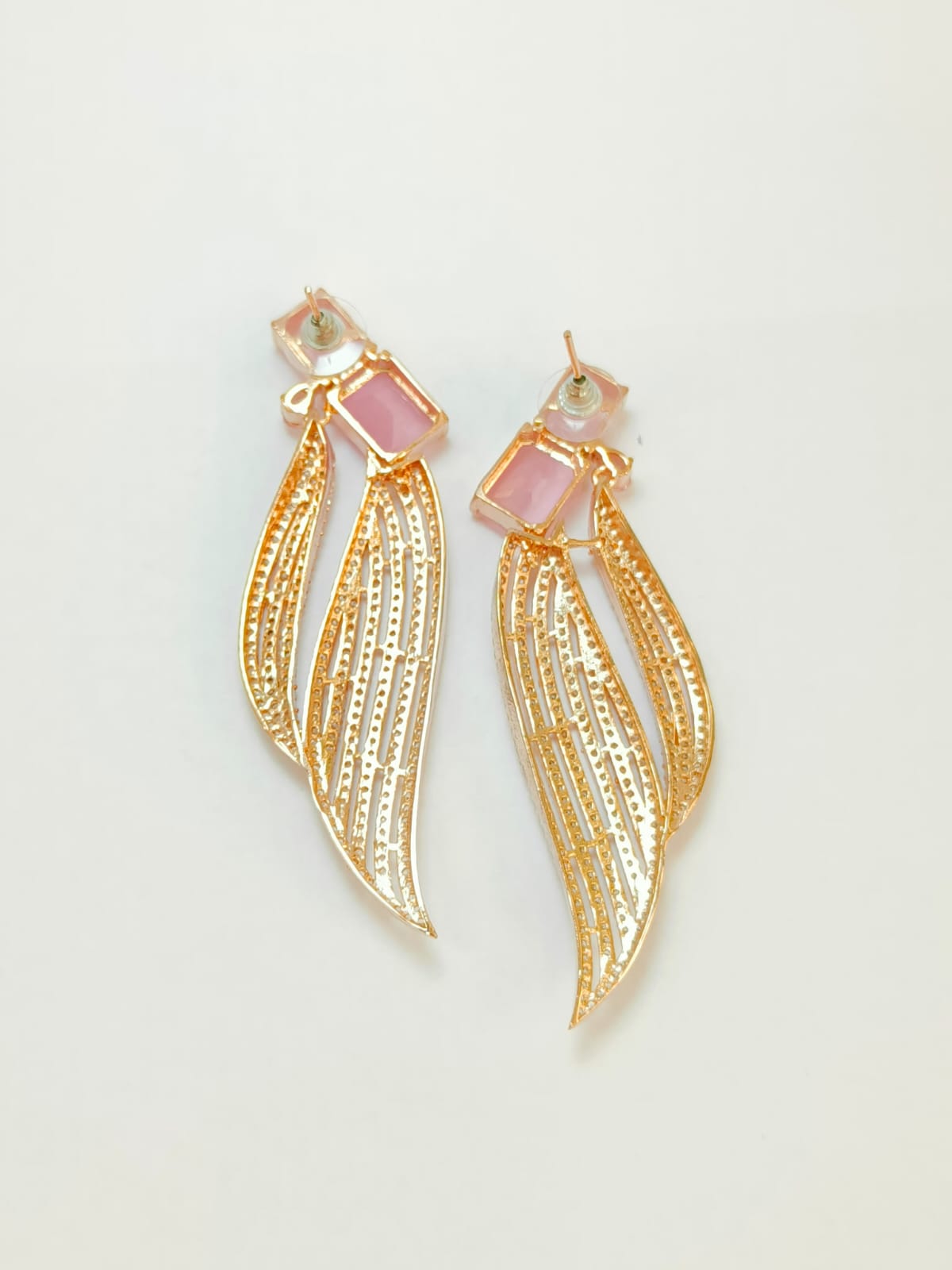 The youthful pink emerald cut dangle earrings