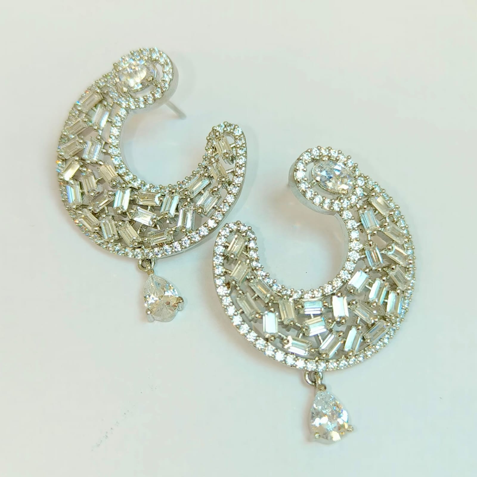The dazzling white half hoop earrings