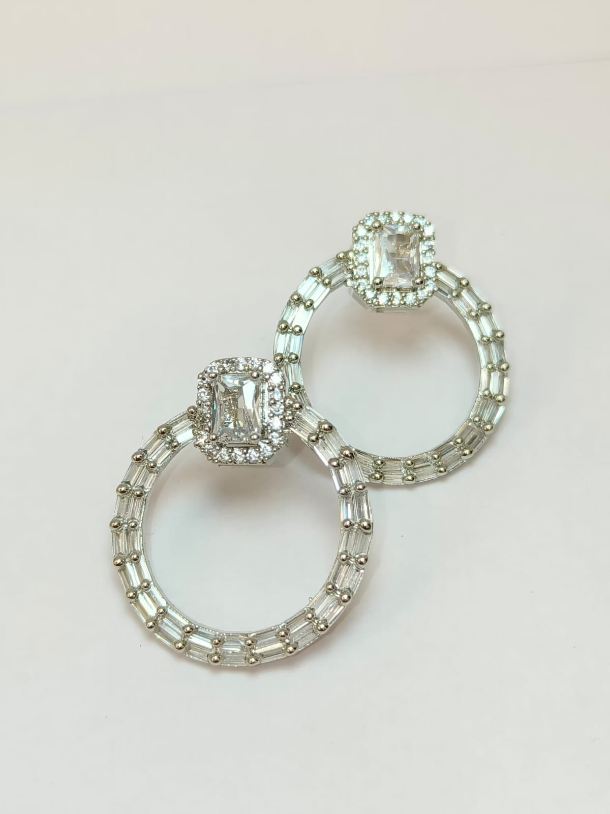 The emerald cut statement hoop earrings