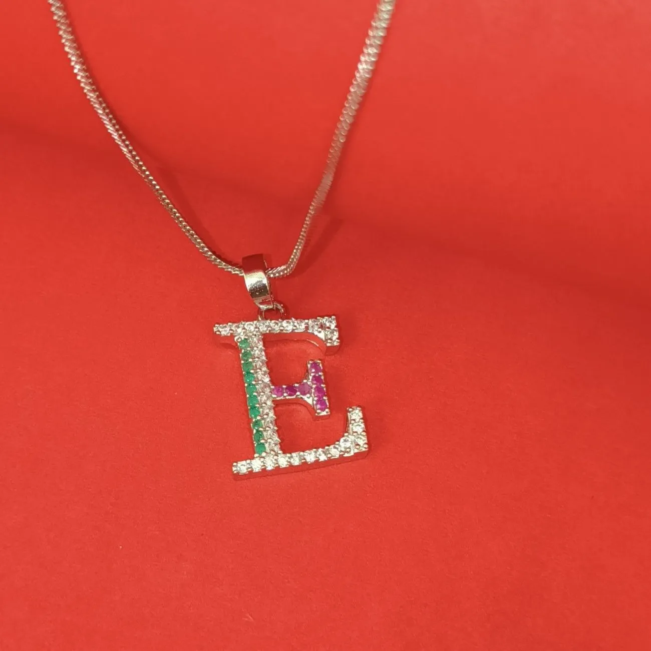 Nimoraa E Initial Silver Plated Pendant Chain with Red & Green Stones