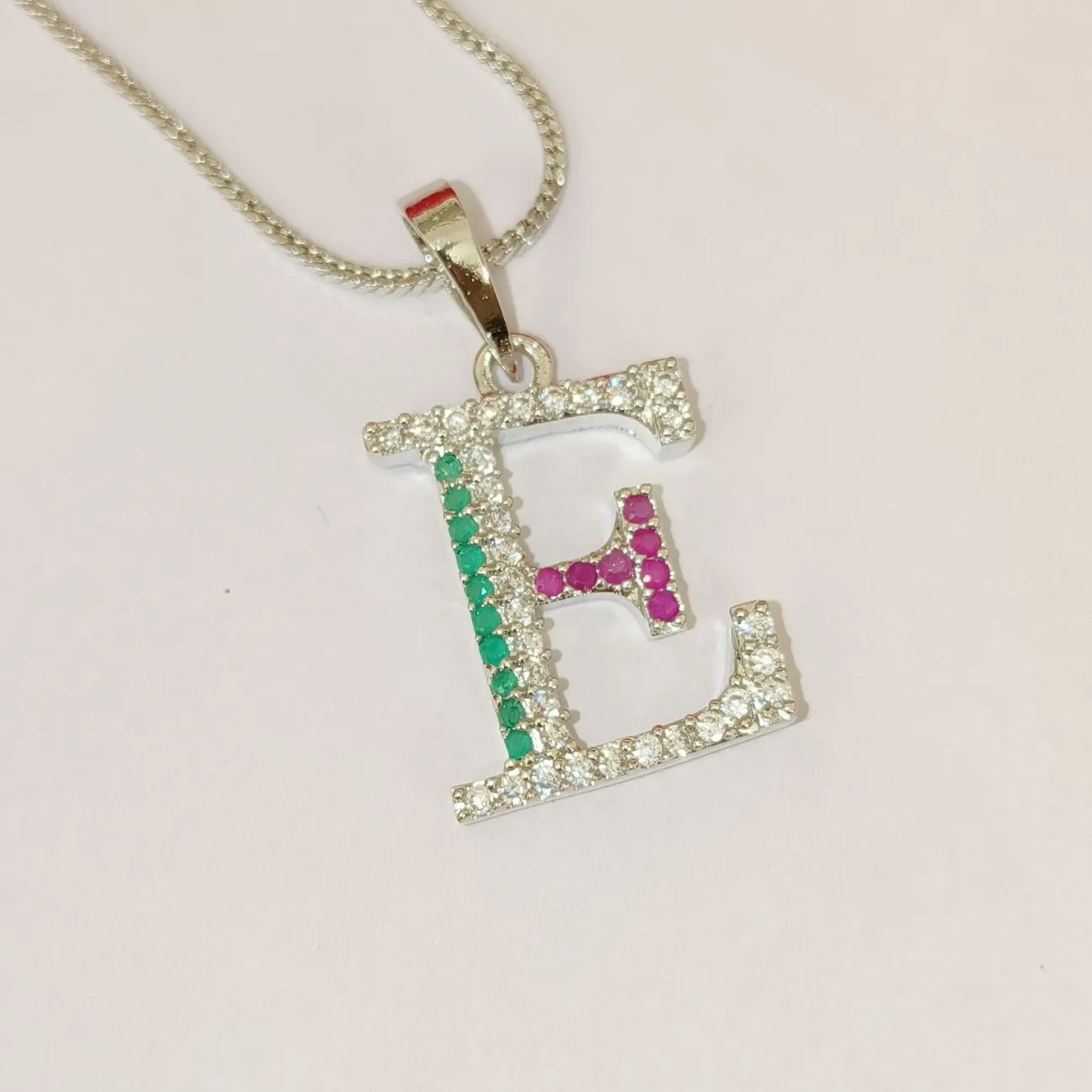 Nimoraa E Initial Silver Plated Pendant Chain with Red & Green Stones