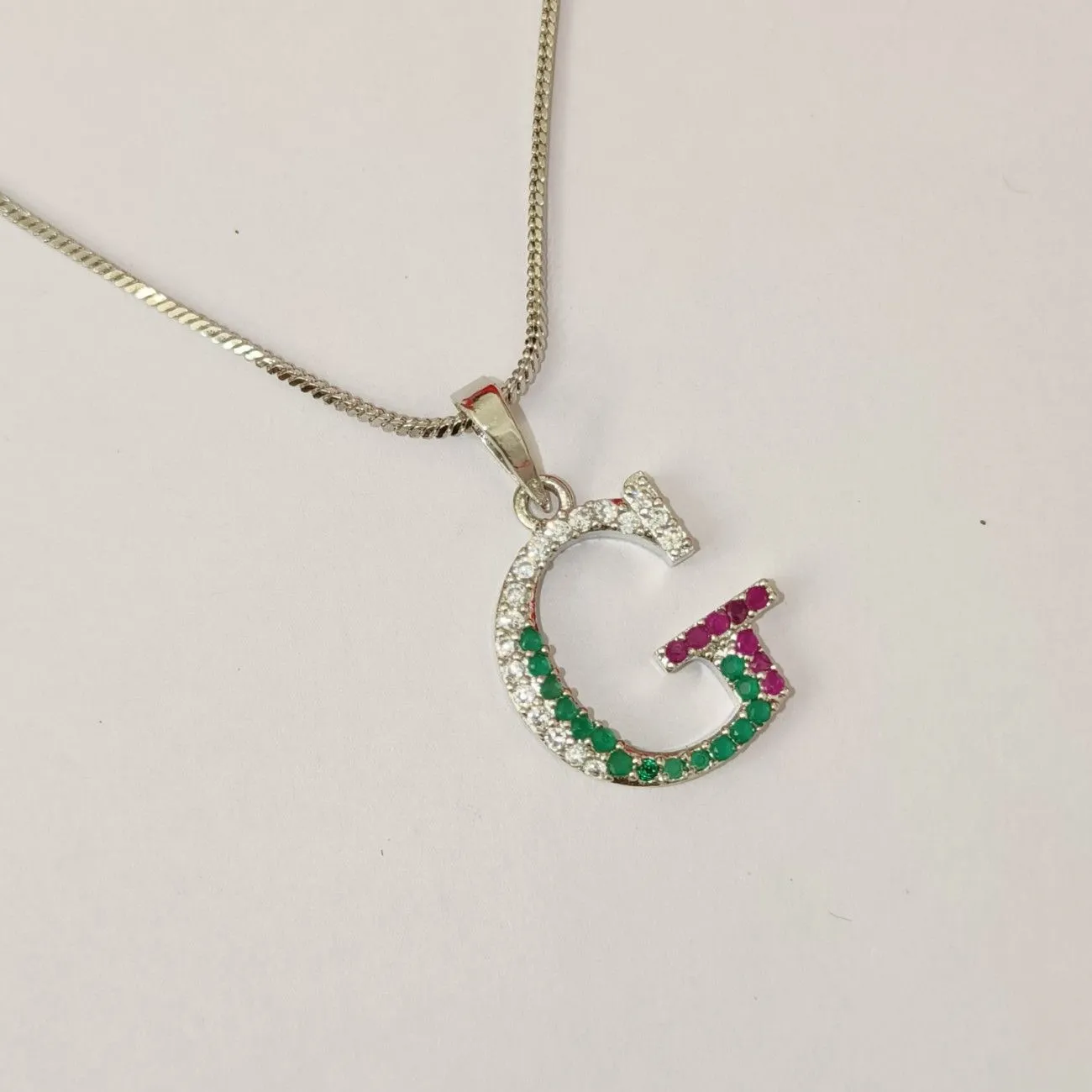 Nimoraa G Initial Silver Plated Pendant Chain with Red & Green Stones