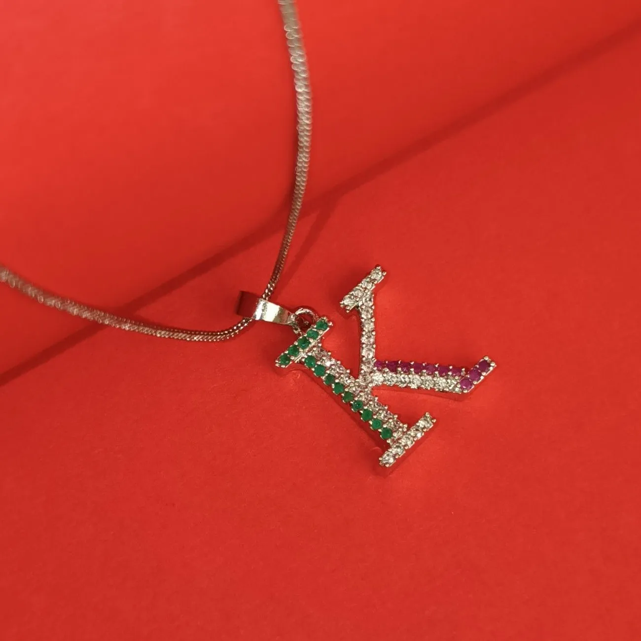 Nimoraa K Initial Silver Plated Pendant Chain with Red & Green Stones