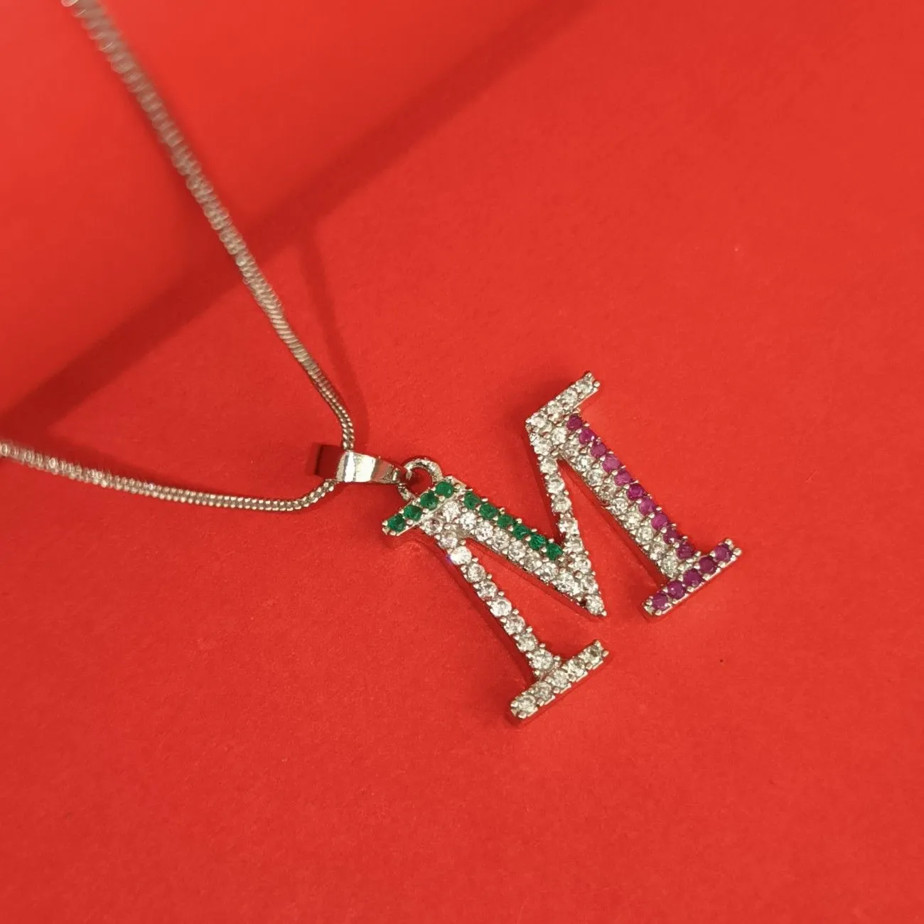 Nimoraa M Initial Silver Plated Pendant Chain with Red & Green Stones