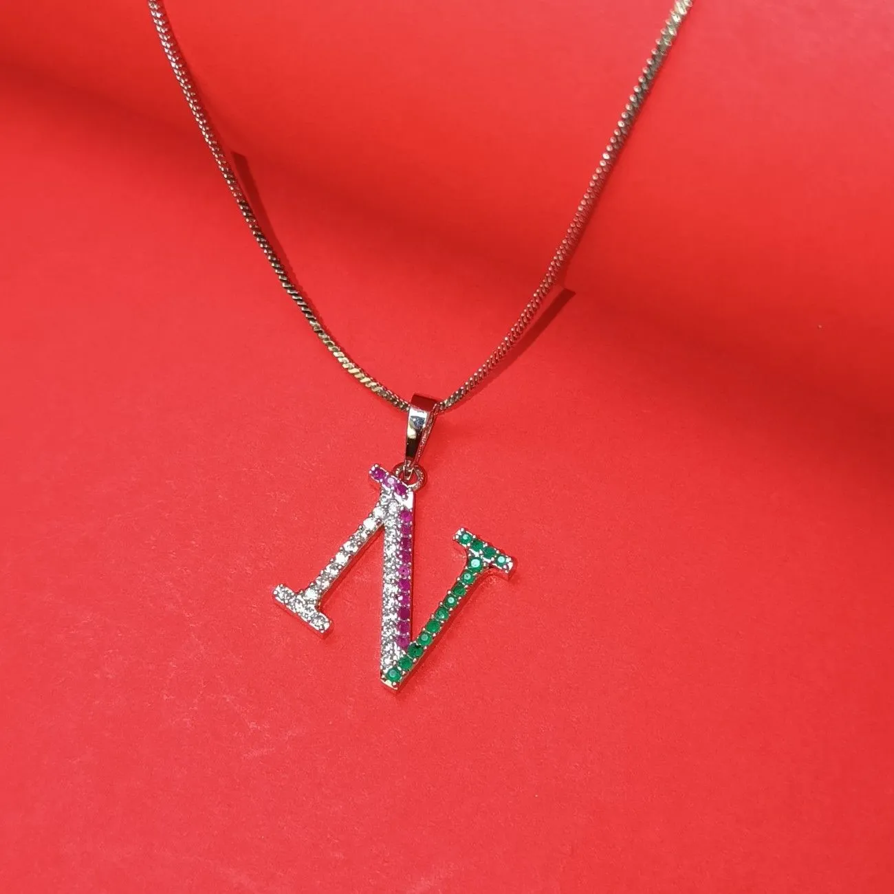 Nimoraa N Initial Silver Plated Pendant Chain with Red & Green Stones