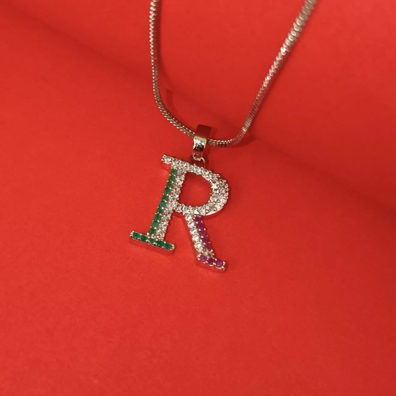 Nimoraa R Initial Silver Plated Pendant Chain with Red & Green Stones