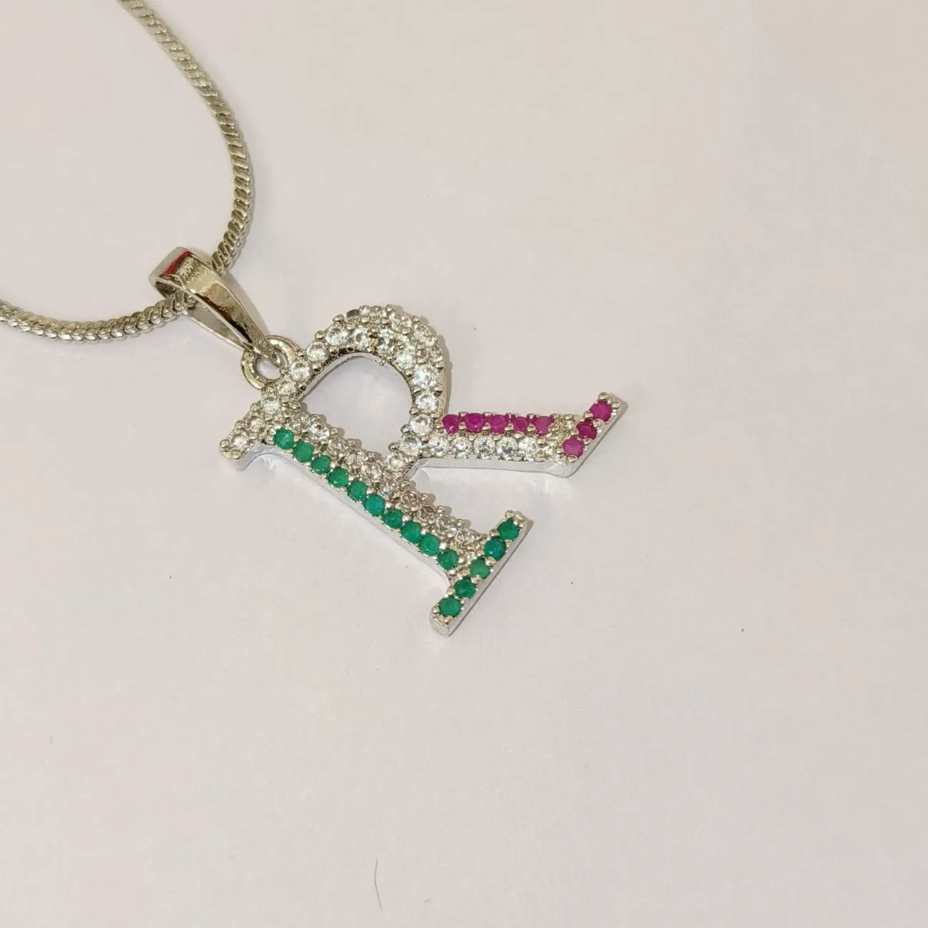 Nimoraa R Initial Silver Plated Pendant Chain with Red & Green Stones