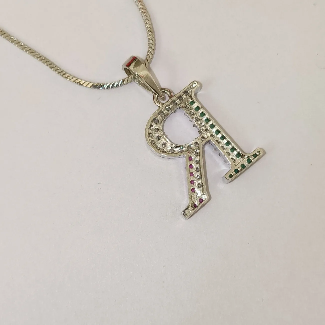 Nimoraa R Initial Silver Plated Pendant Chain with Red & Green Stones