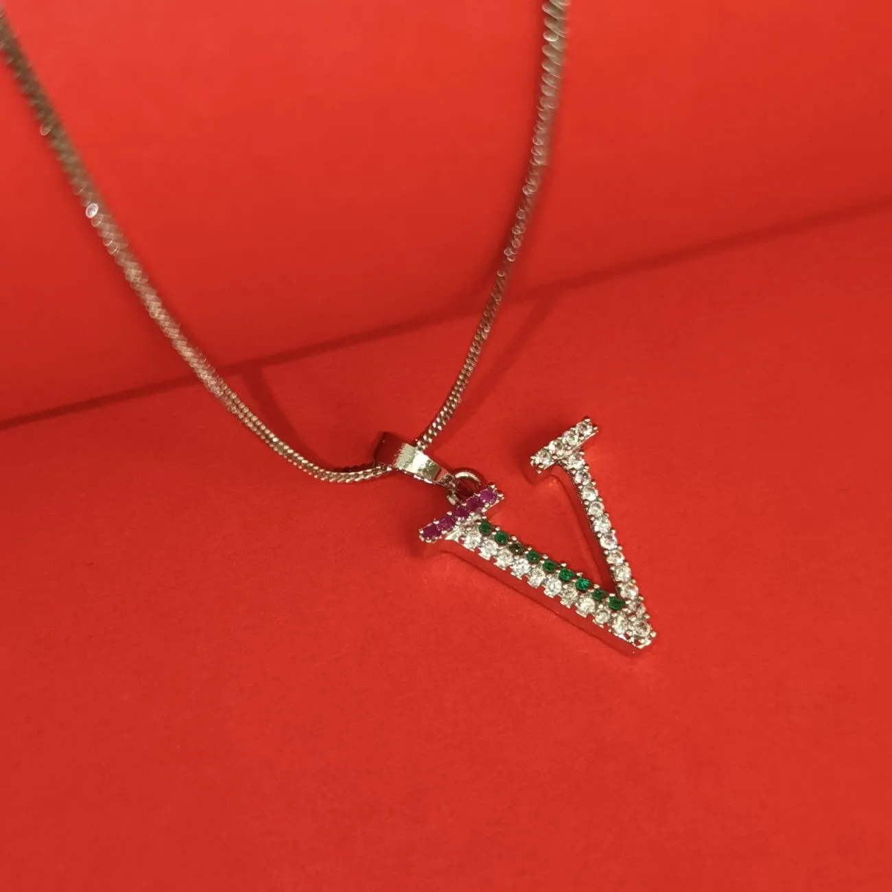 Nimoraa V Initial Silver Plated Pendant Chain with Red & Green Stones