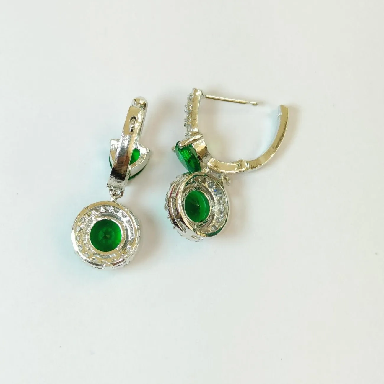 The Silver Love-Bomb green earrings