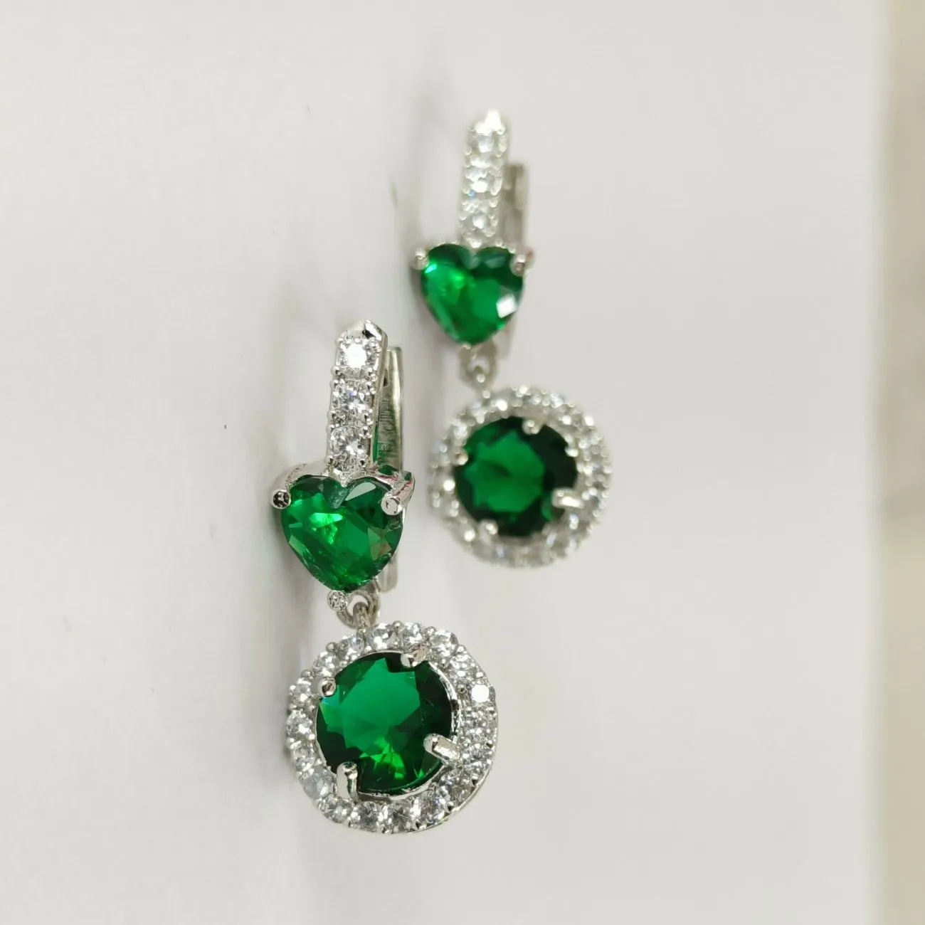 The Silver Love-Bomb green earrings